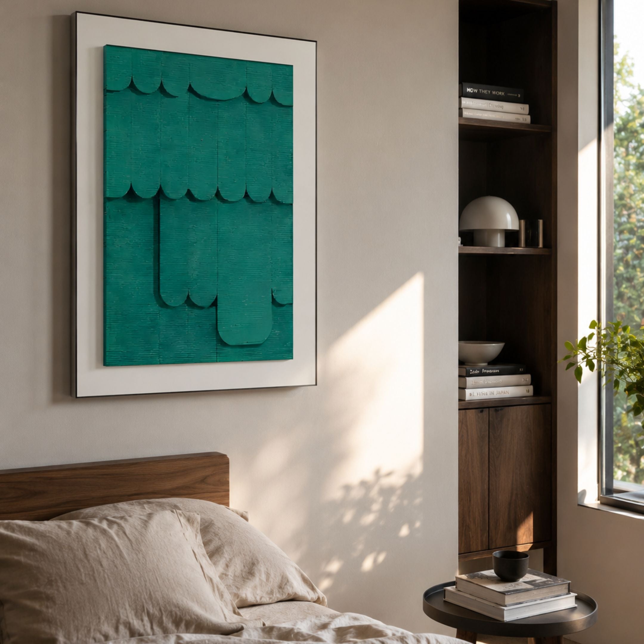 Cascala Teal Layered Wood Carving 3D Wall Art by Giant Sculptures displayed above a wooden bed, beside a dark shelving unit holding books and decor.