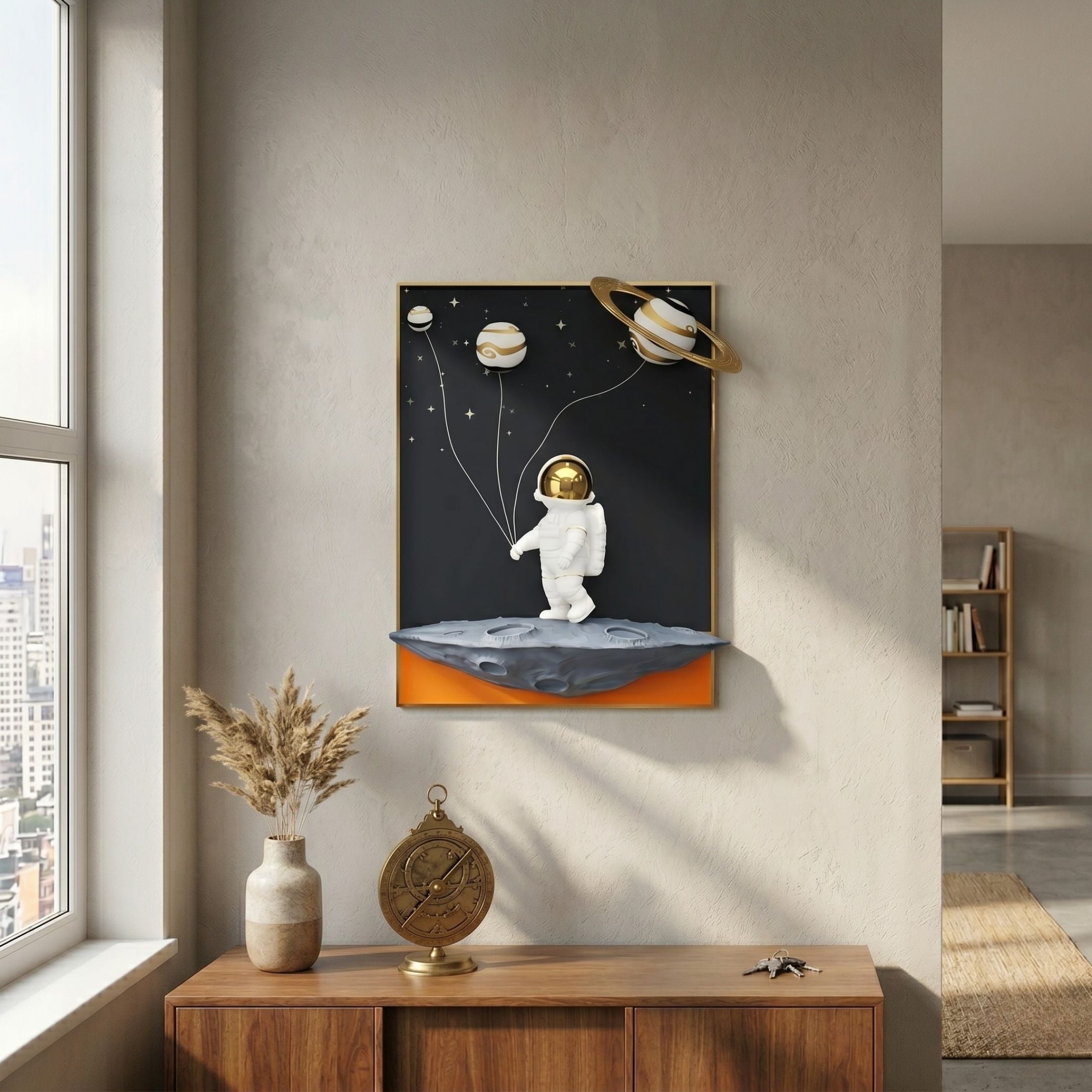 White 3D Stellar Astronaut Planet Balloons Wall Art by Giant Sculptures, displayed above a wooden console with a pampas vase and brass astrolabe in a sunlit room.