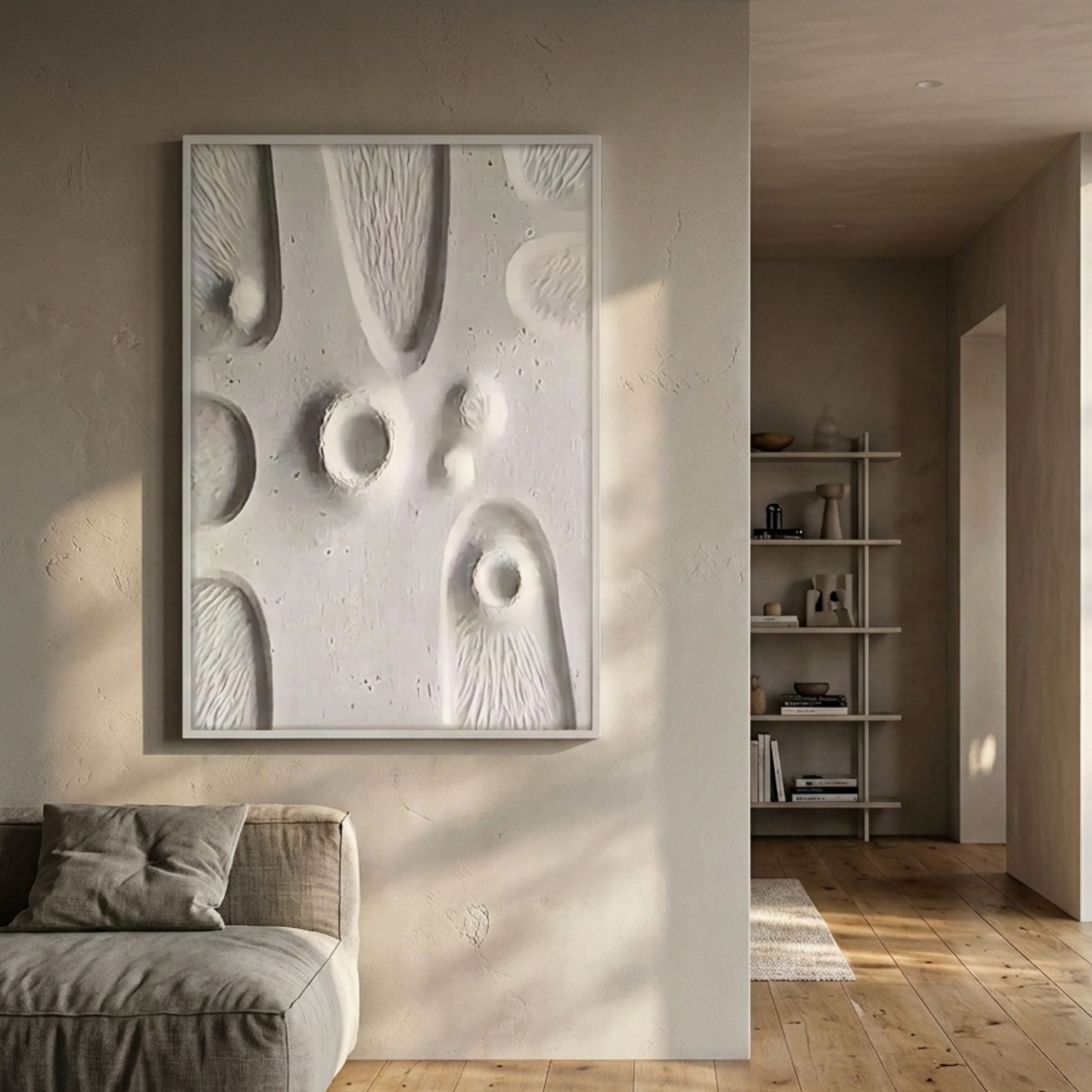 Terravura Rectangular Soft White II 3D Wood Relief Wall Art with sculpted oval and circular forms, displayed in a neutral living room beside a linen sofa.