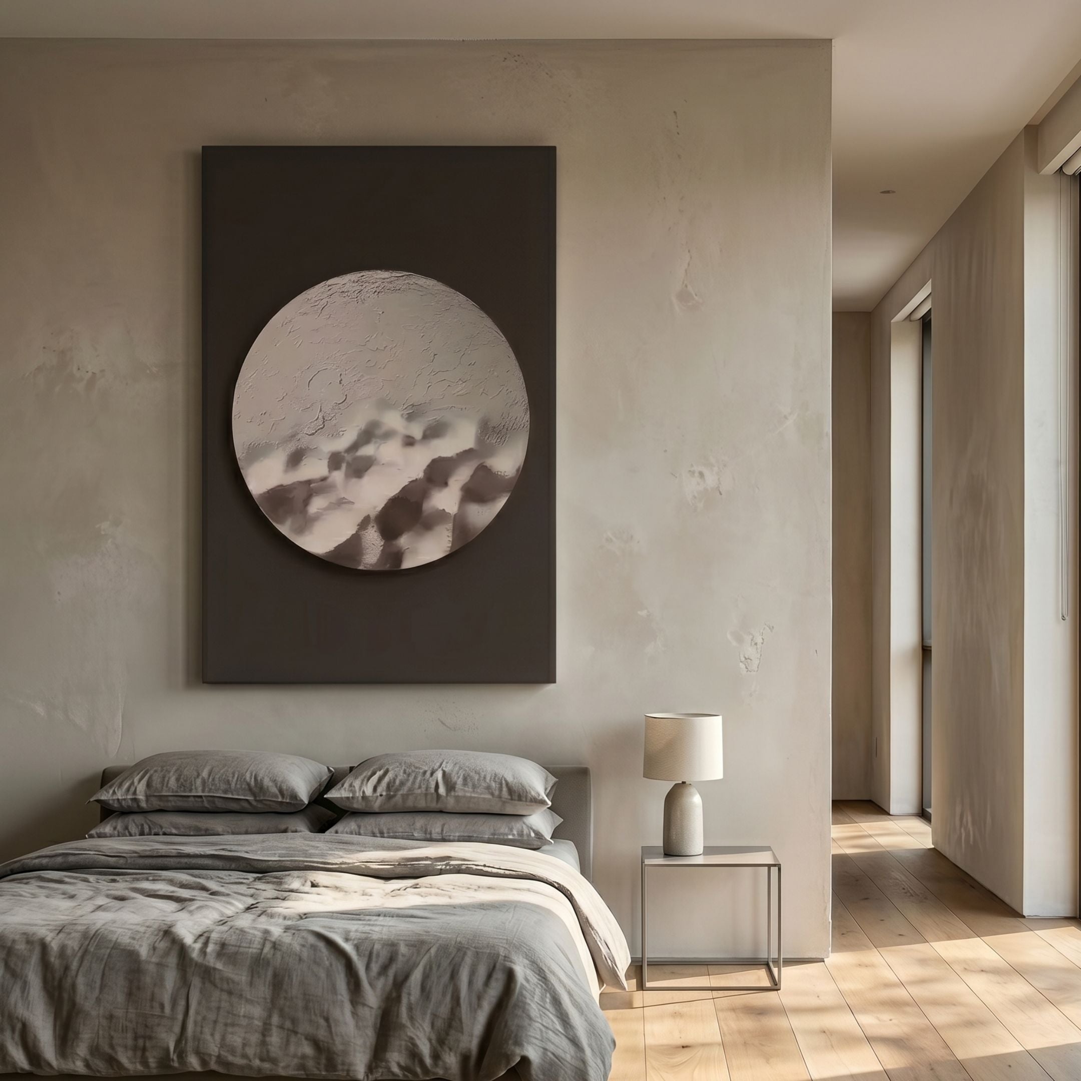 Solivis Arctic 3D Wood Relief Wall Art by Giant Sculptures, a pale carved circular disc on a dark rectangular panel, displayed above a grey linen bed in a minimalist bedroom.