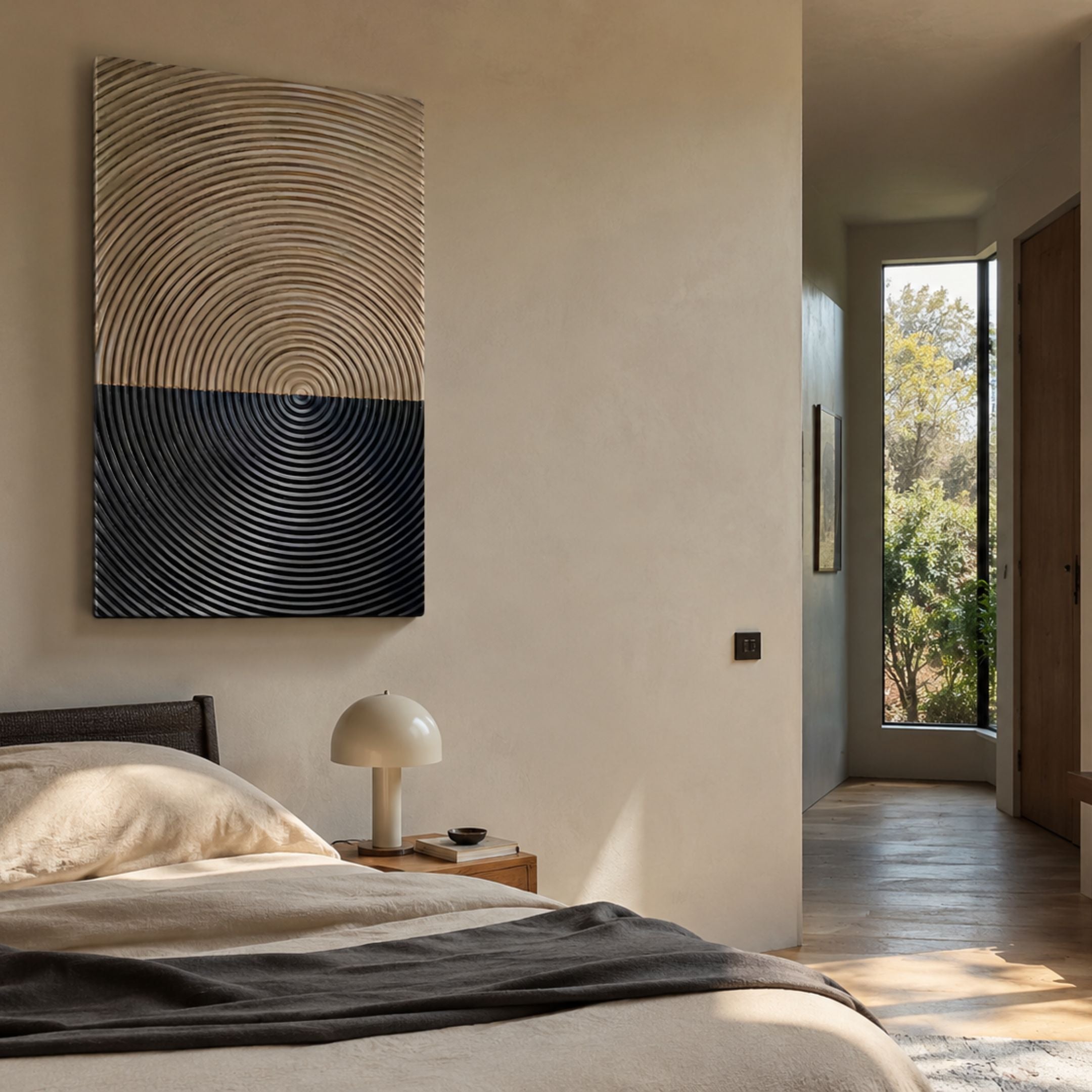 Artura Beige & Black Hand-Painted 3D Relief Wall Art by Giant Sculptures displayed above a bedside table with dome lamp in a sunlit cream-walled bedroom.