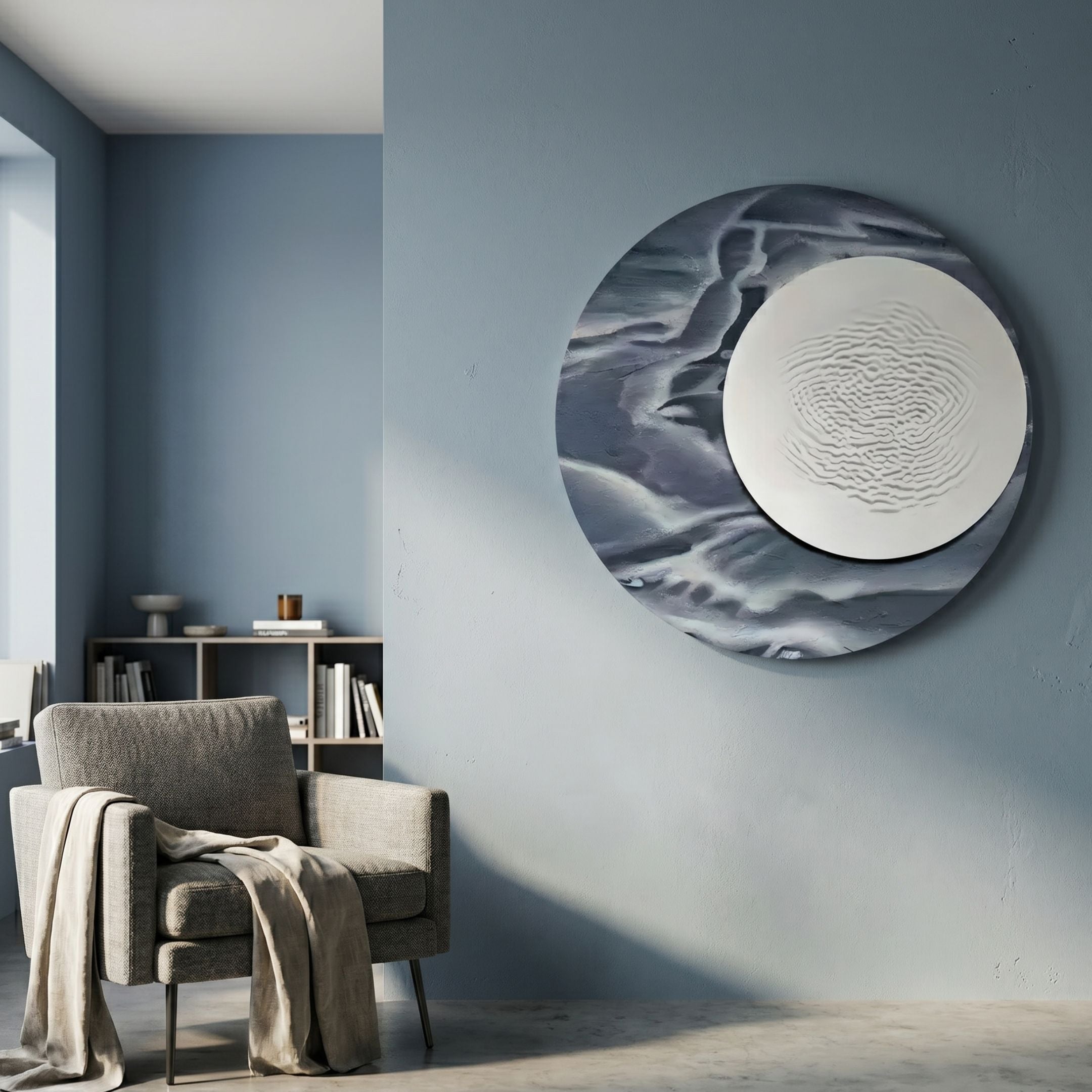 Reveria Midnight Blue Abstract Wood Carving 3D Wall Art mounted on a blue wall above a grey armchair, with a bookshelf and decor in the adjacent room.