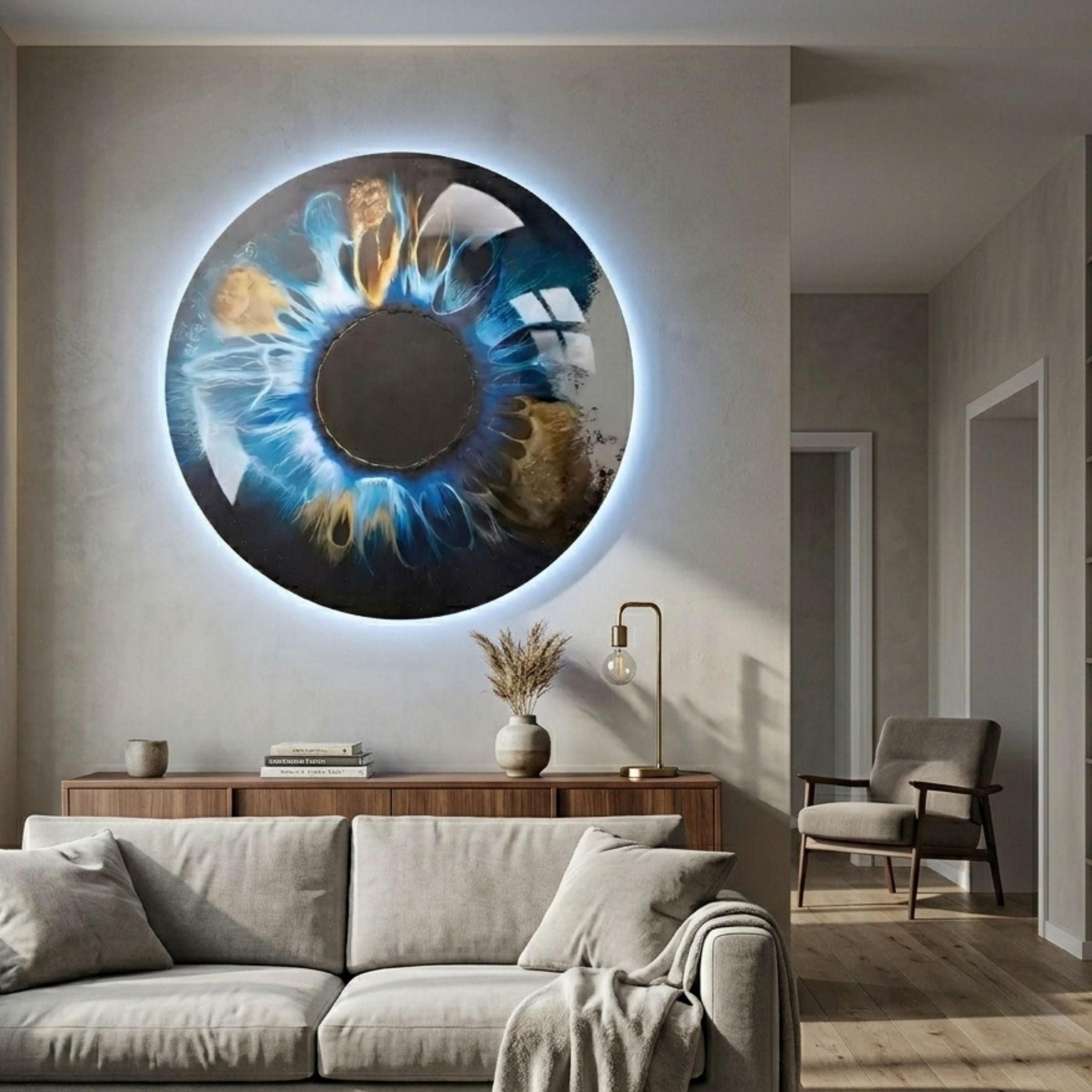 Genesis Earth Tones 3D Resin Crystal Porcelain LED Wall Art by Giant Sculptures, a circular iris-like piece with blue, gold, and white streaks, mounted above a wooden sideboard in a modern living room.