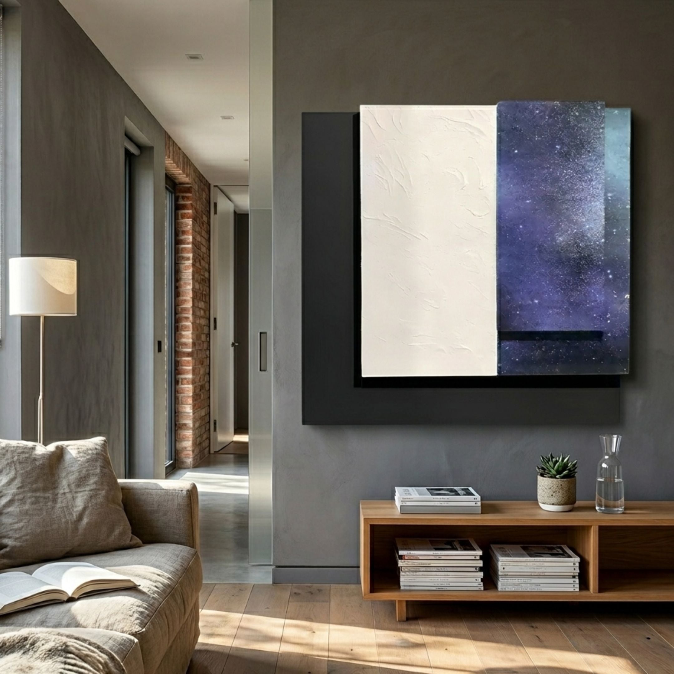 Astra Galaxy Blue Textured Wood Carving 3D Wall Art mounted above a wooden console in a modern living room with grey walls, linen sofa, and floor lamp.