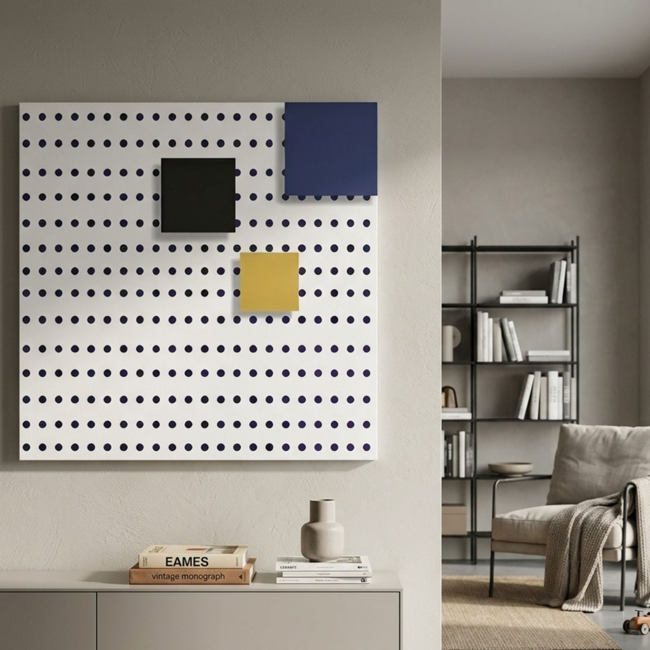 Orison Geometric Play Crystal Porcelain 3D Wall Art by Giant Sculptures, white panel with black dot grid and blue, black, and yellow accent squares, in a living room.