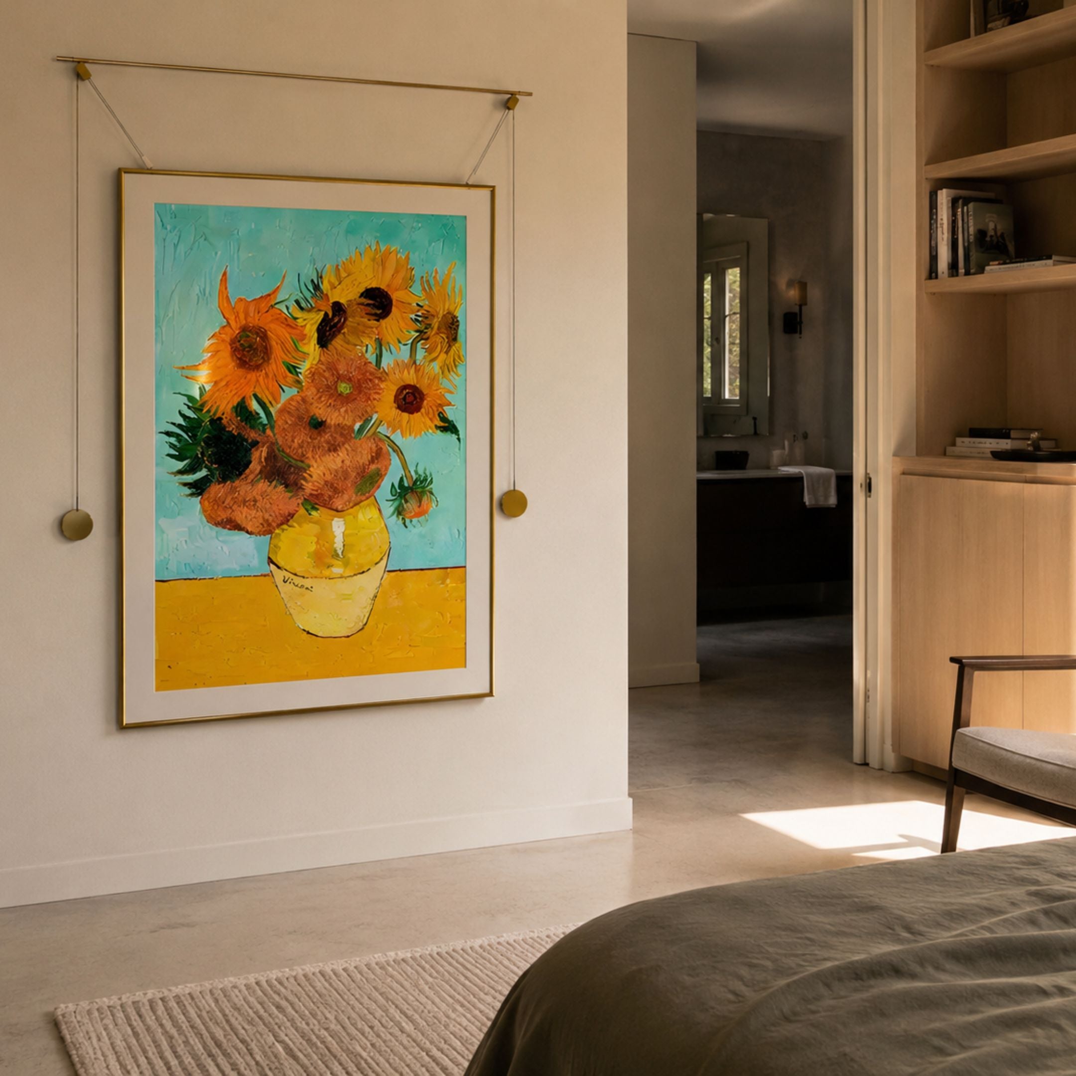 Reverra Vibrant Sunflowers Hanging Frame Wall Art with gold rods displayed on a cream bedroom wall beside an open doorway and wooden shelving.