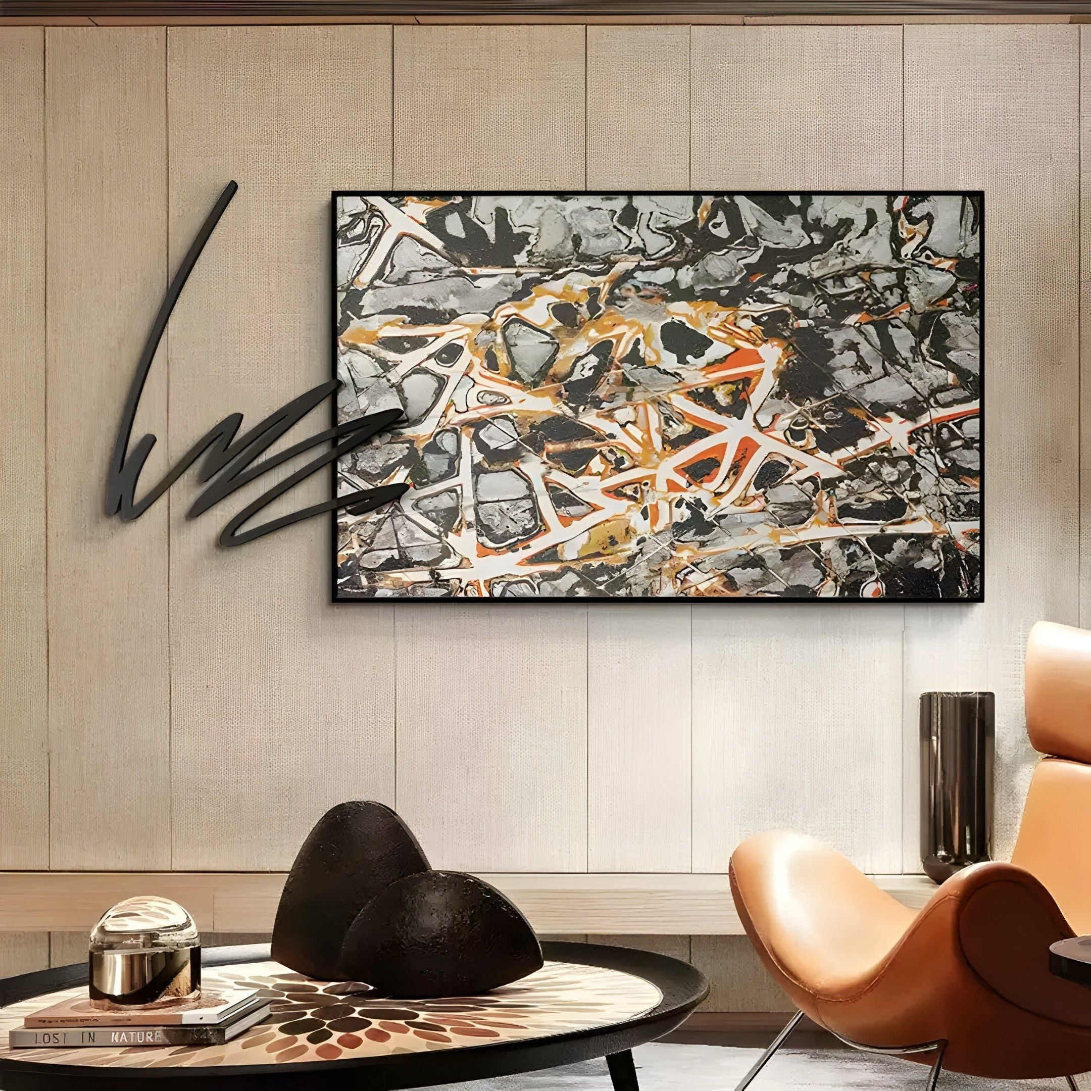 Graffio Urban Chaos Orange Network Abstract Wall Art by Giant Sculptures displayed above a console with black iron scribble extending past the frame in a modern lounge.
