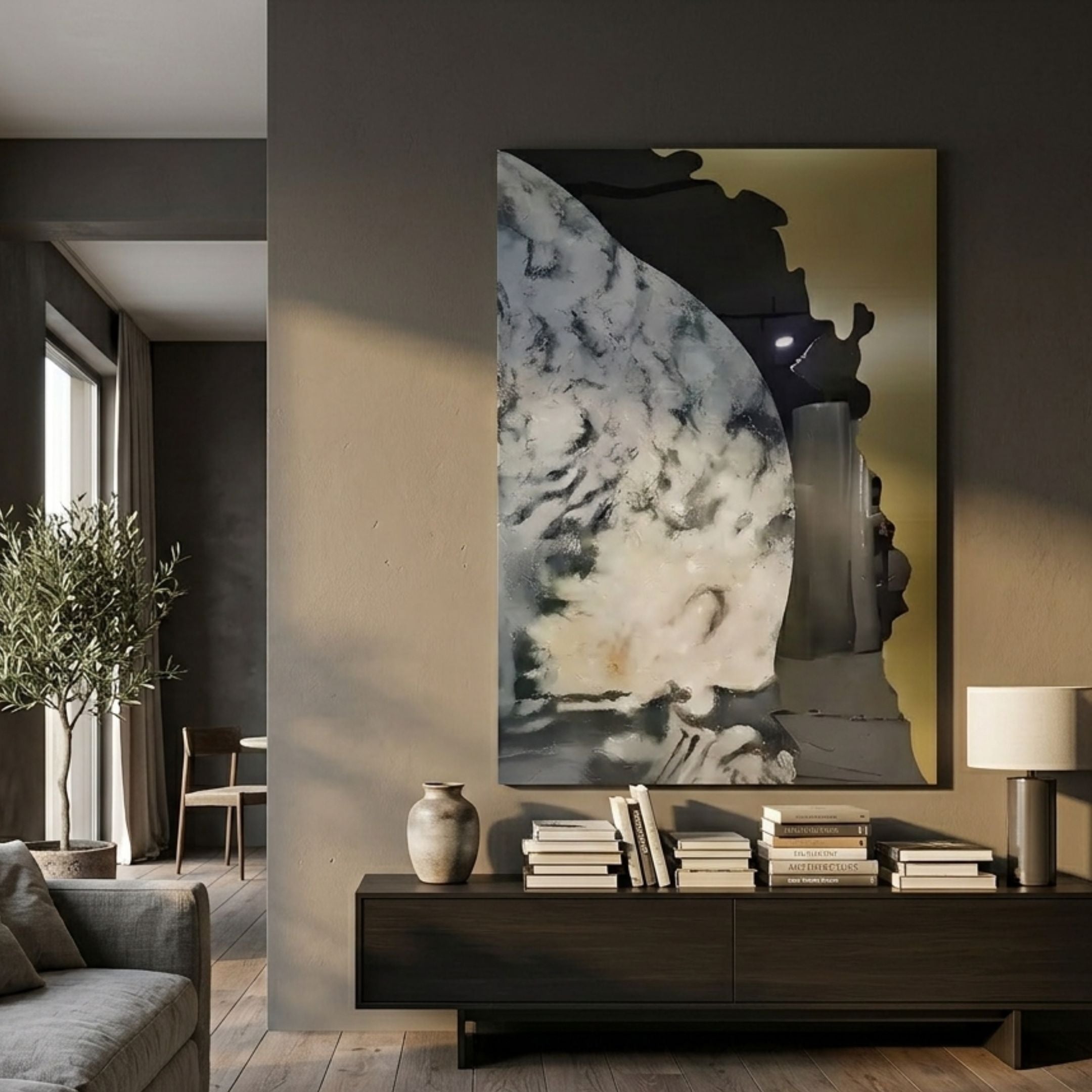 Astrid Celestial Drift Gold Accent Abstract Wall Art with marbled curve and gold field, hung above a dark sideboard with books in a modern living room.