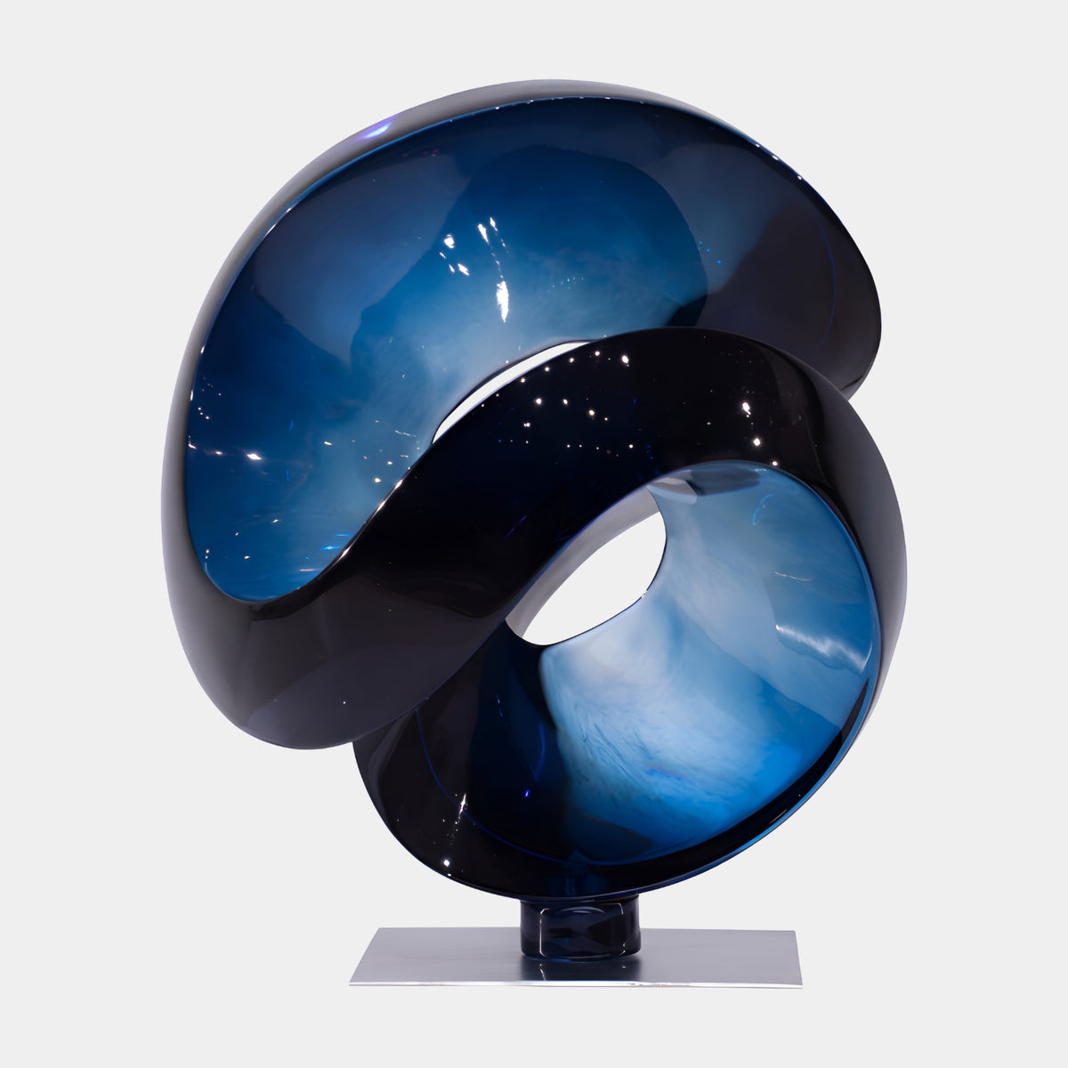 Dark Blue Two Scoop Cut Sphere Resin Sculpture (32cm) with glossy swirled scoops on a cylindrical base and flat silver plate, shown against a plain white background.