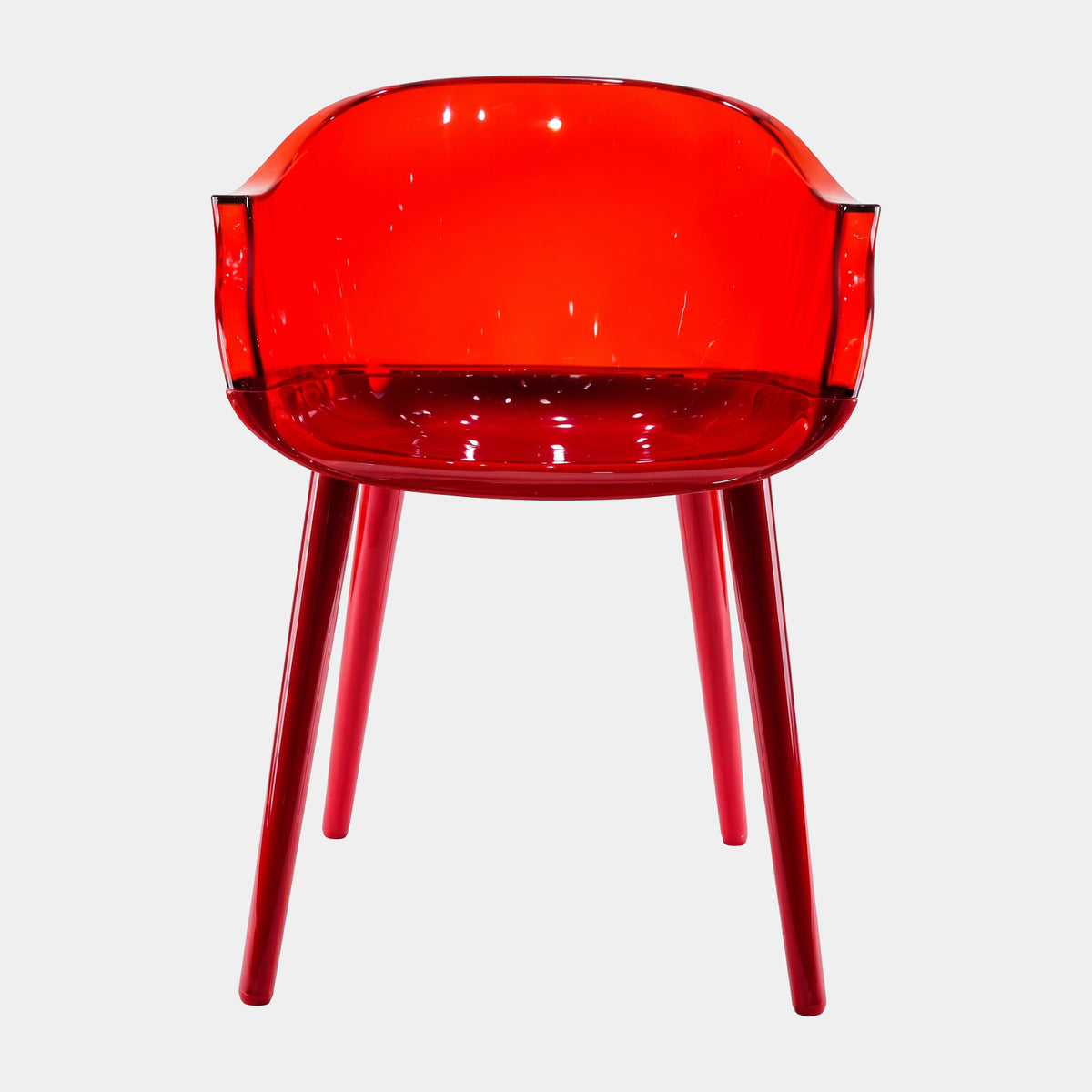 Red Translucent Tub Acrylic Armchair on Tapered Legs, 79cm, front view on a plain white background, showing the rounded tub shell and matching red legs.