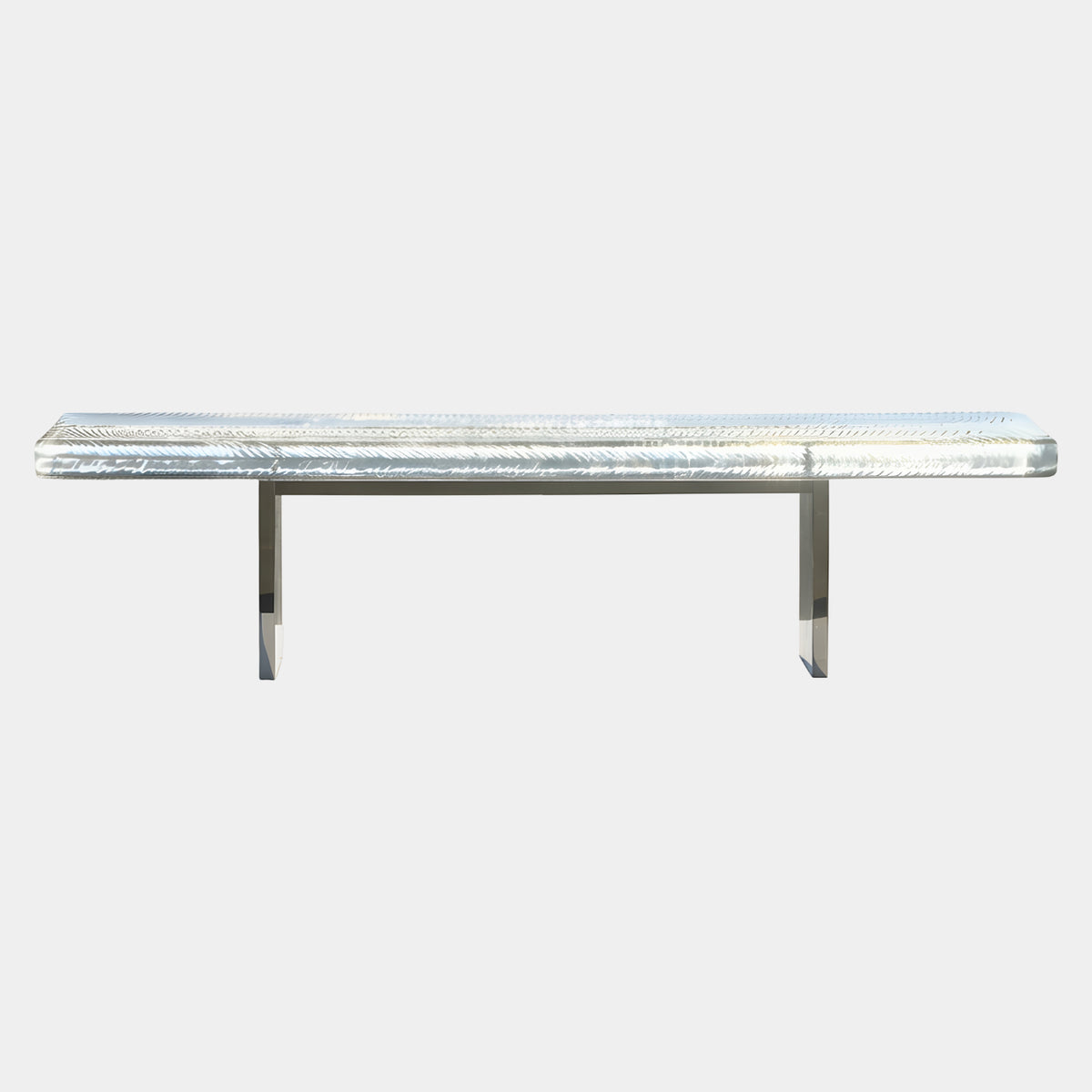 Clear Combed Panel Bench on a Metal Trestle, 180cm, with feathered-line acrylic seat on polished silver legs, shown on a plain white background.