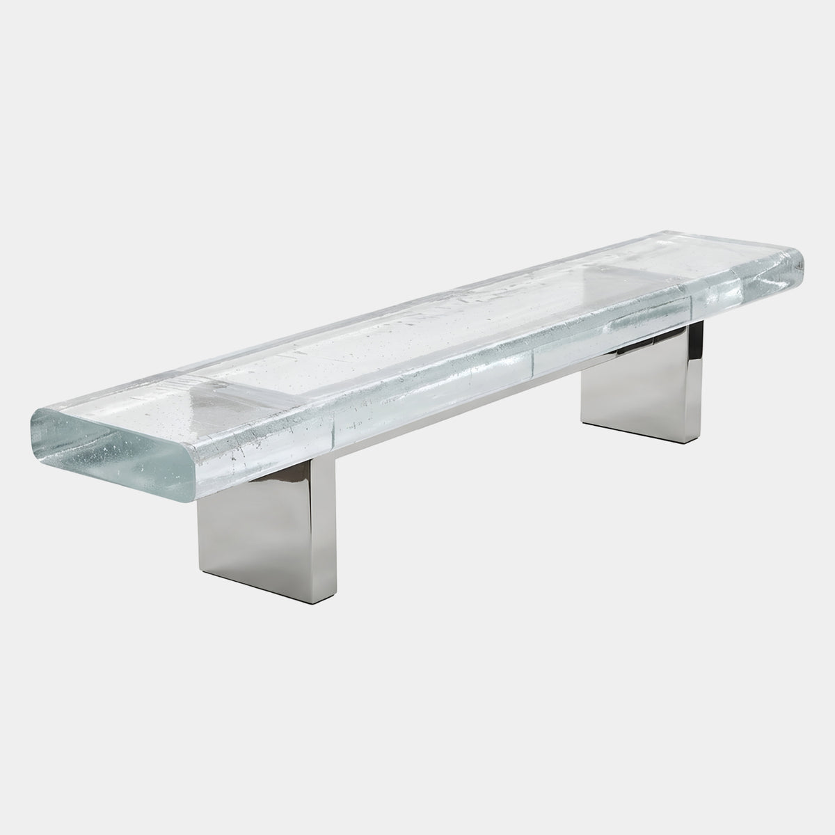 Clear Grained Panel Bench on Two Metal Blocks (300cm) by Giant Sculptures, a clear acrylic slab with grained top on polished metal block supports, shown on a plain white background.