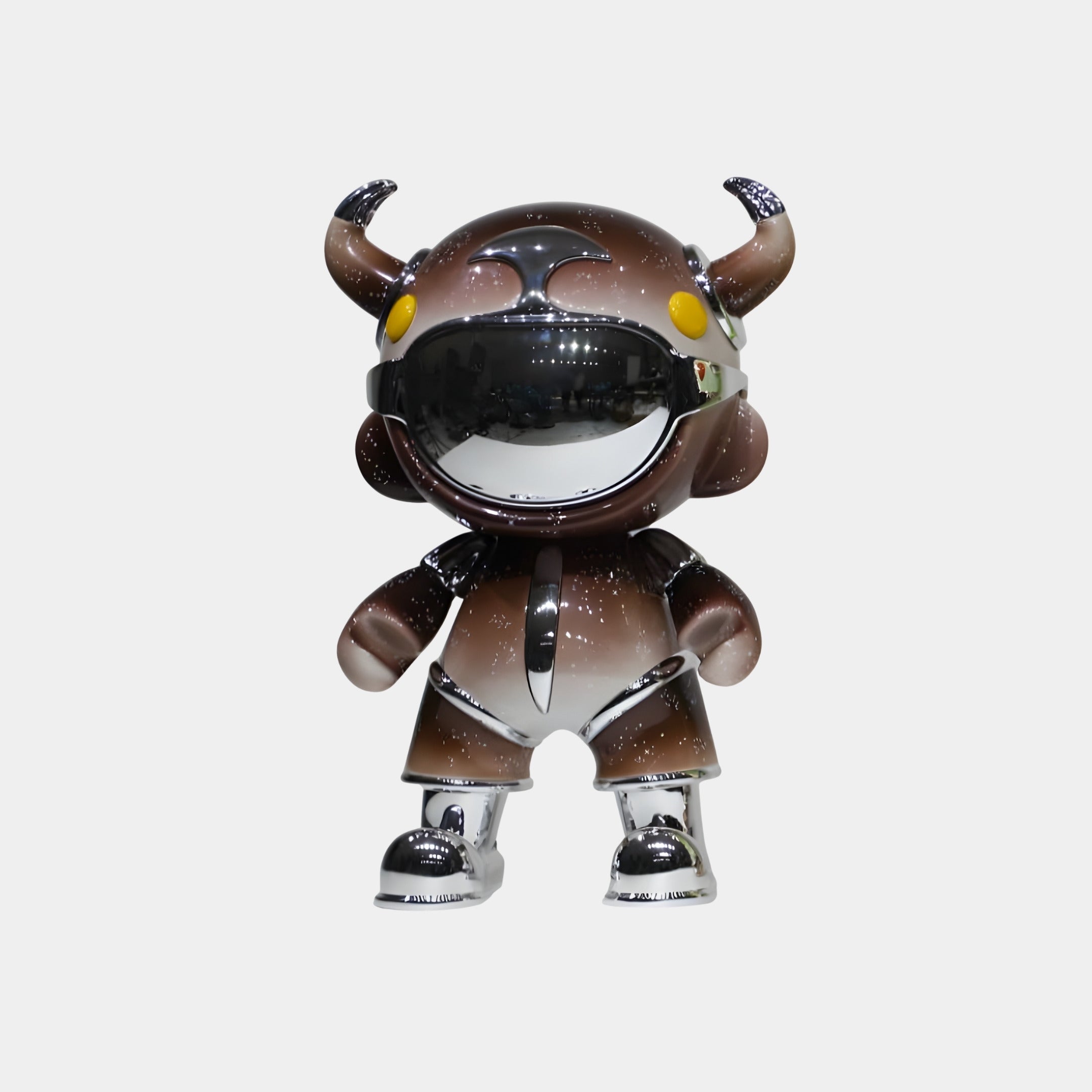 The Deep Brown Suit Astro Devil Figure by Giant Sculptures stands upright against a plain white background, featuring shiny brown and silver details, yellow eyes, a wide mirrored visor, and horns on its head. Height: 48cm.
