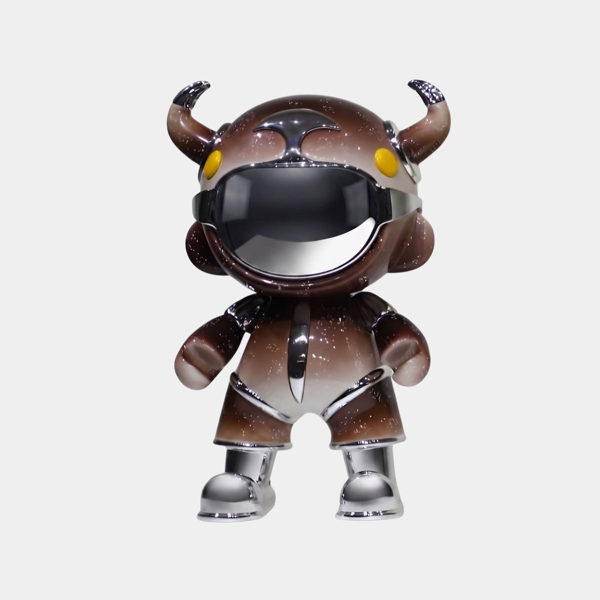The Giant Sculptures Deep Brown Suit Astro Devil Sculpture (80cm) features a horned helmet, yellow circular eyes, and a reflective visor with contemporary metallic finishes, standing upright on a plain white background.
