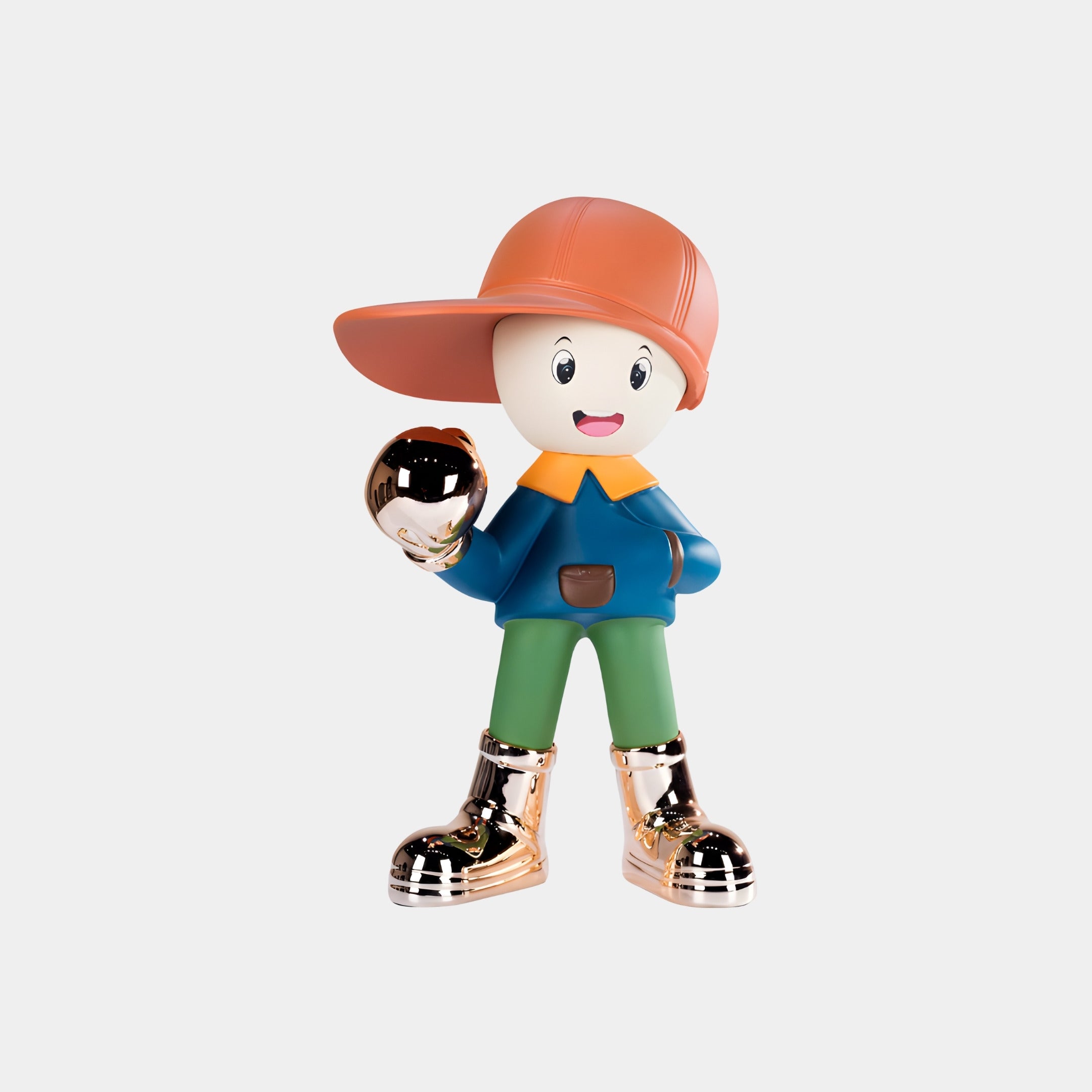 The Giant Sculptures Electroplated Boots & Fist Coral Brimble Figure (52cm) features a cartoonish design with a large orange cap, blue shirt, green pants, shiny gold electroplated boots and fist, holding a reflective gold sphere, against a plain background.