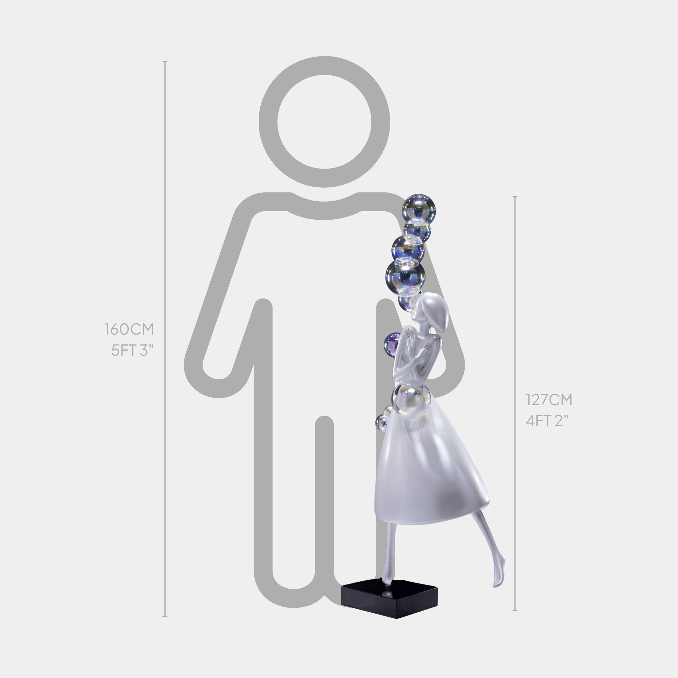 The Giant Sculptures Iridescent White Bubble Girl Sculpture - 127cm features a metallic, iridescent girl in a dress with silver bubbles on a black base. At 127 cm tall, it’s shown beside a 160 cm silhouette as a contemporary statement piece.