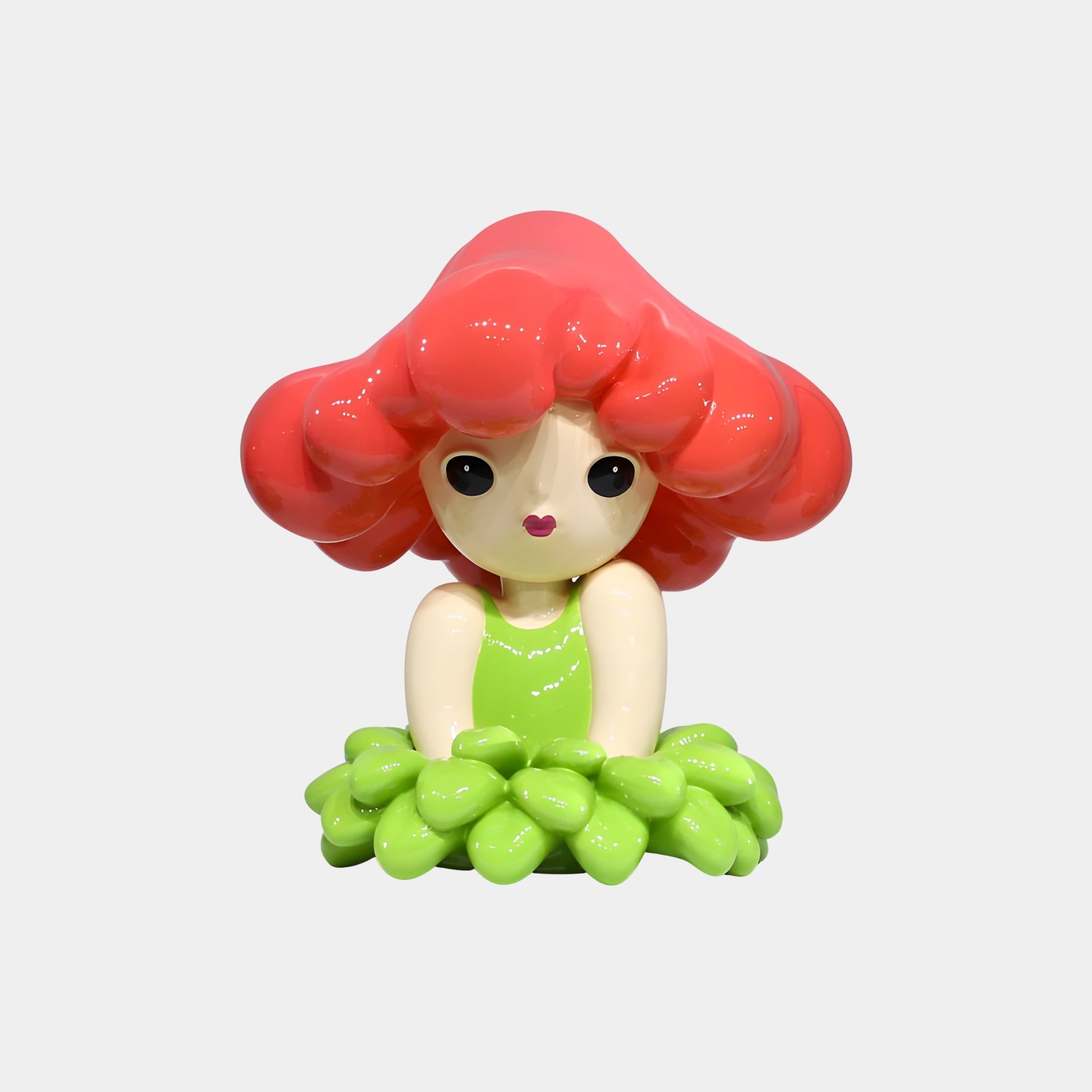The Coral Hair Bloomelle Flower Girl Figure (45cm) by Giant Sculptures features glossy red flower petal hair and a green leaf-like dress, perfect as botanical-inspired decor. Shown against a plain light gray background.