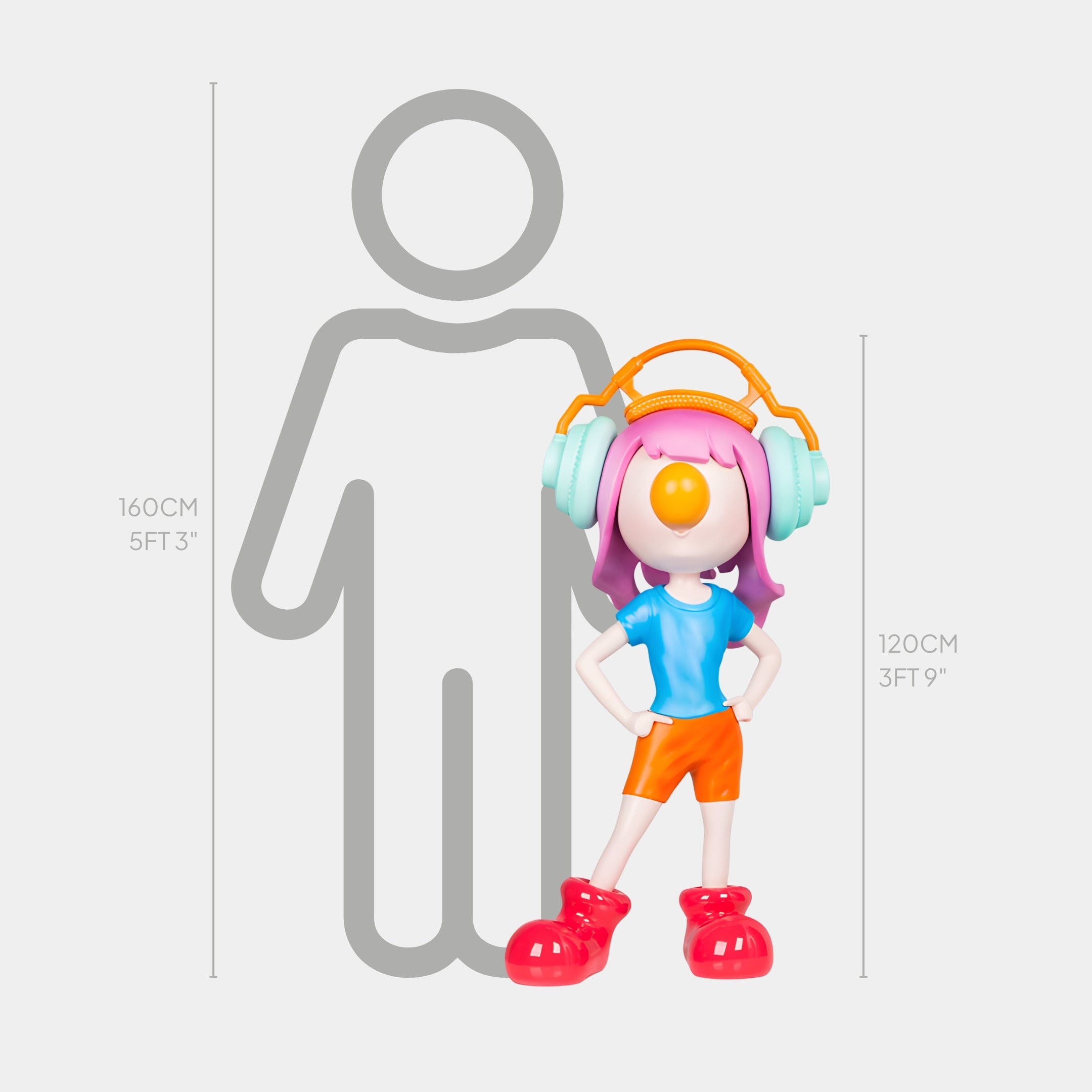 The Candy Pop Vibella Headphone Sculpture by Giant Sculptures features pink hair, orange headphones, and a blue shirt. Measuring 120cm x 65cm x 62cm, it stands nearly as tall as the adjacent 160cm (5 ft 3 in) human figure.