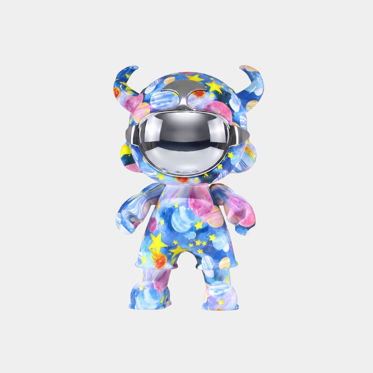 The Galaxy Orbit Astro Devil Figure - 35cm by Giant Sculptures features horns, a shiny black visor, and a blue galaxy-themed surface with stars, planets, and nebulae, making it a striking display piece against a white background.