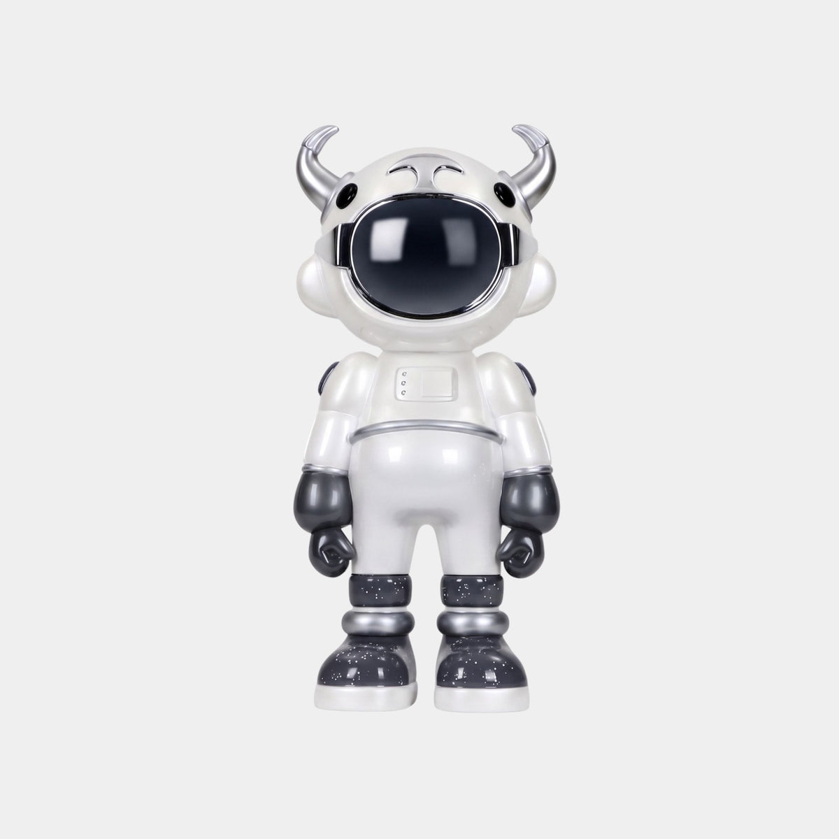 The Giant Sculptures Arctic White Astro Robot Figure - 48cm stands upright with a large black visor, small horns, and black-and-white boots, resembling a sci-fi sculpture against a plain light gray background.