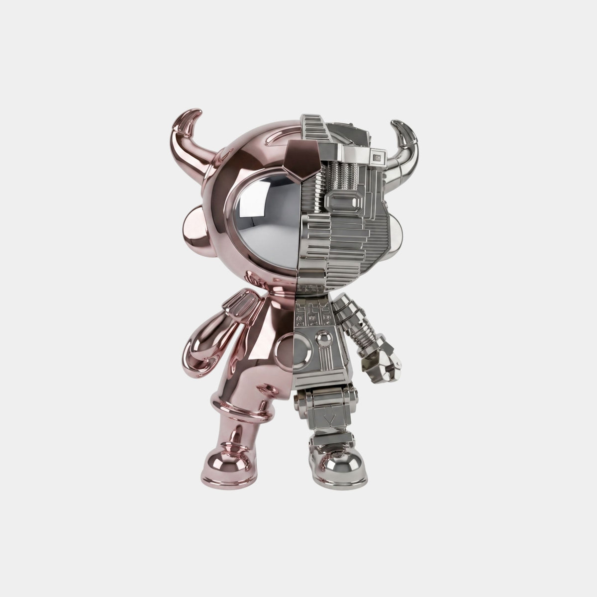 The Rose & Silver Split Astro Devil Figure by Giant Sculptures is a 35cm eco-friendly resin collectible featuring shiny horns, with one half in smooth pink metallic and the other in silver, exposing robotic mechanical details.