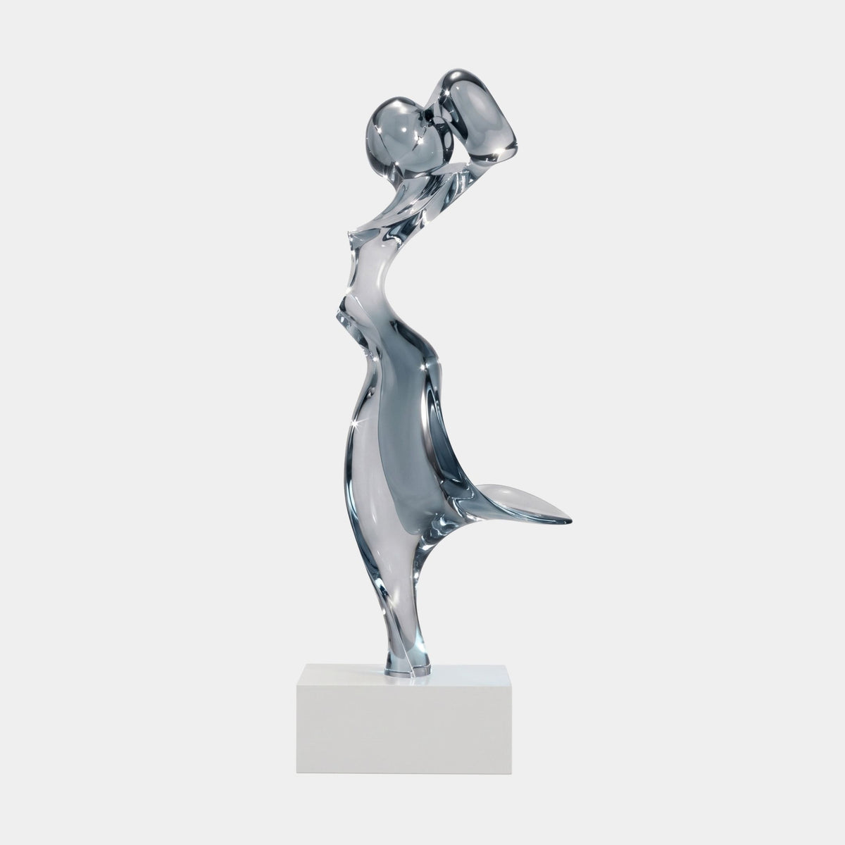 Smoke Grey Windblown Lady Resin Sculpture, 165cm, translucent figure of a woman with dress streaming behind her, on a white marble block, plain light background.