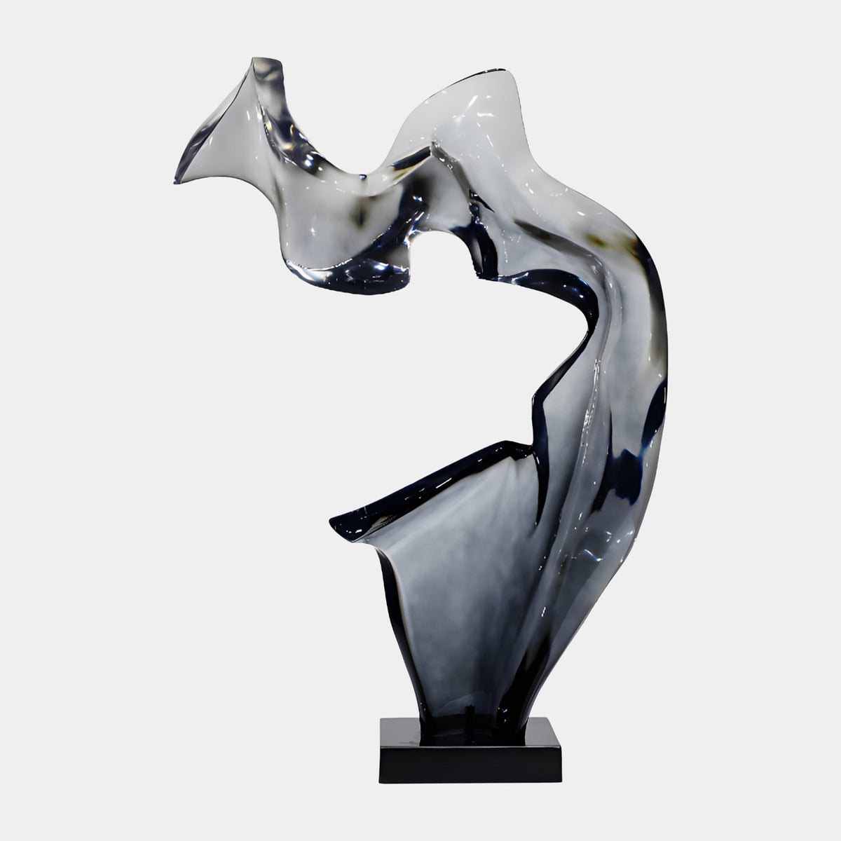Smoke Grey Arched Abstract Resin Sculpture - 129cm, a curved form rising from a splayed foot to a flared, almost clear top, set on a black marble base against a plain light background.