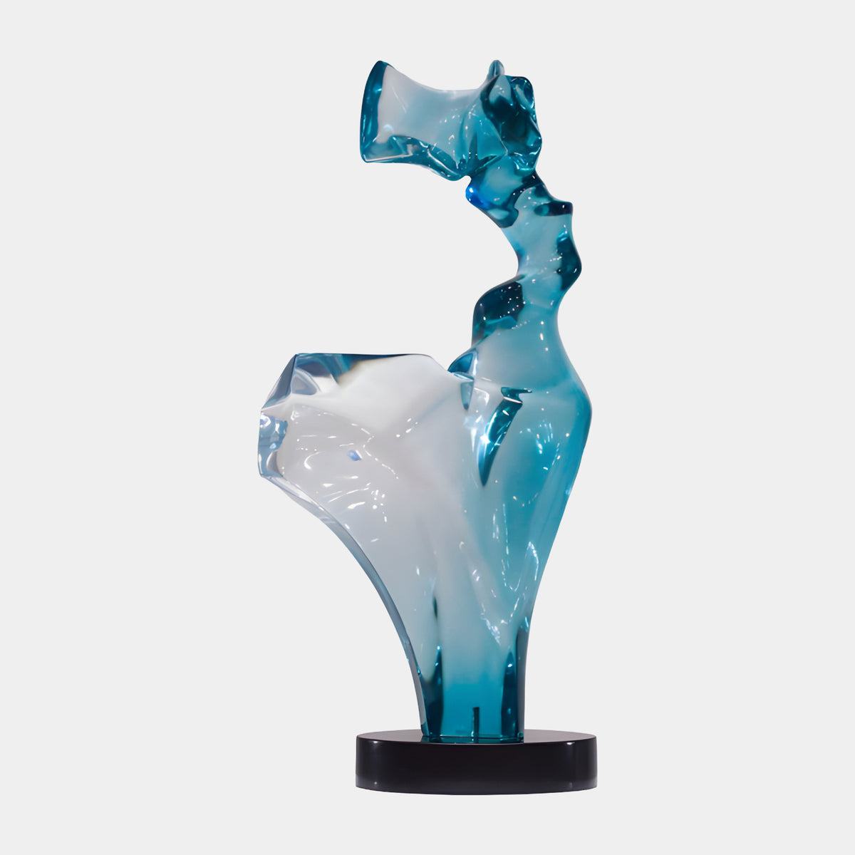 Teal & White Windblown Figure Resin Sculpture, 69cm, abstract windswept form on a round black base, set against a plain white background.