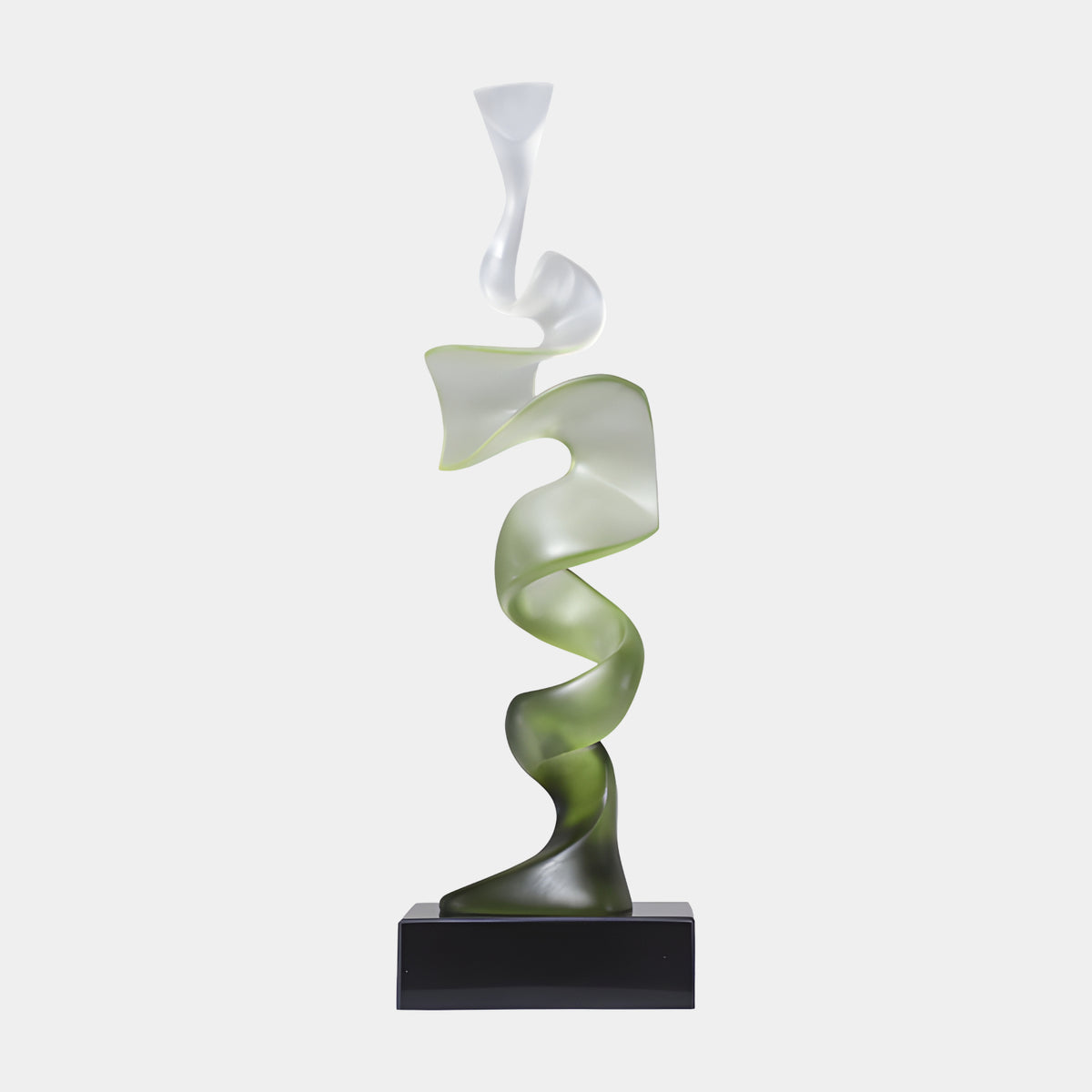 Green & White Spiral Ribbon Resin Sculpture - 65cm, a frosted ribbon spiraling from green at the base to white at its trumpet crown, on a black marble block against a plain light background.