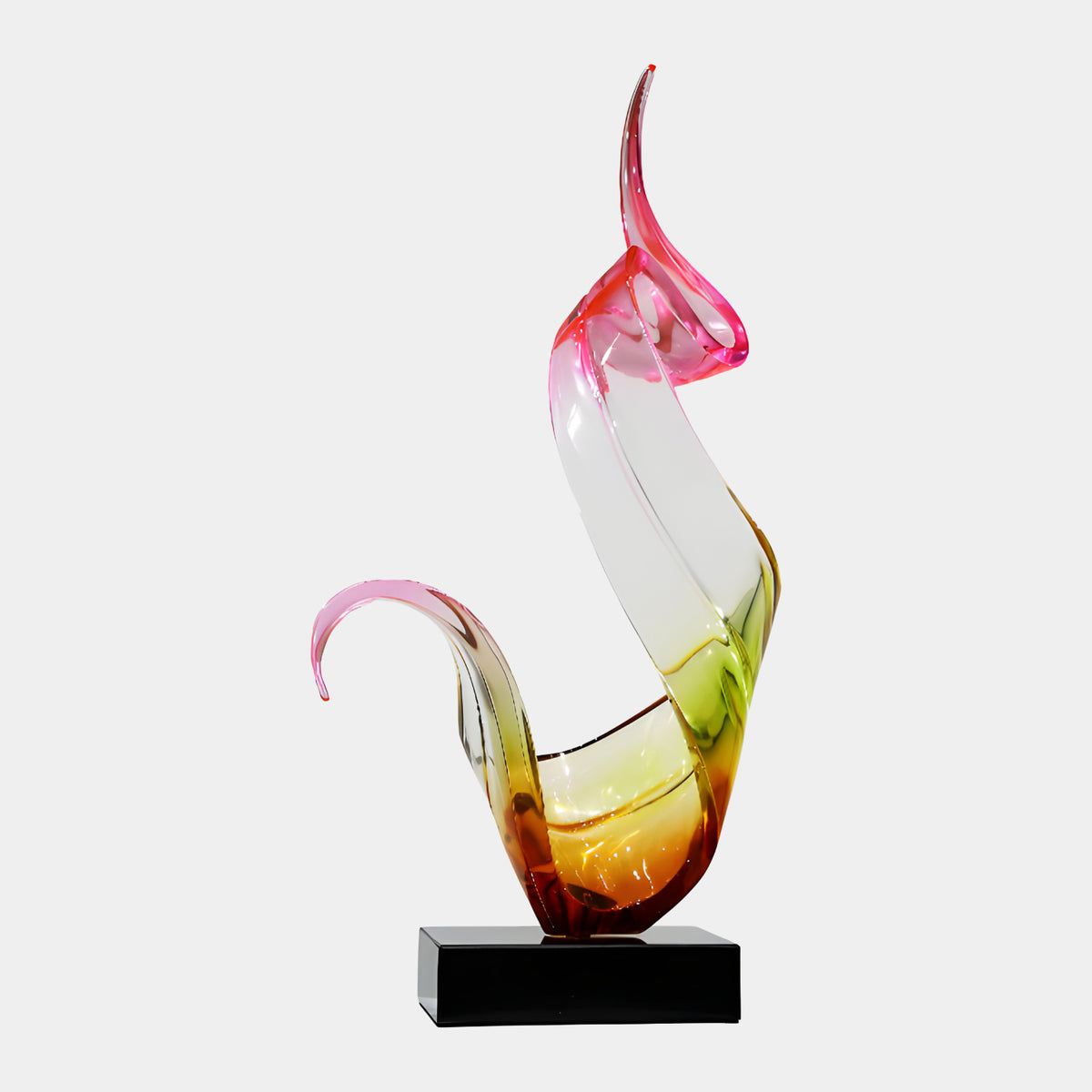 Pink to Amber Hooked Ribbon Resin Sculpture, 86cm, a curling ribbon form shifting from pink through clear and green to amber on a black marble base, shown against a plain white background.