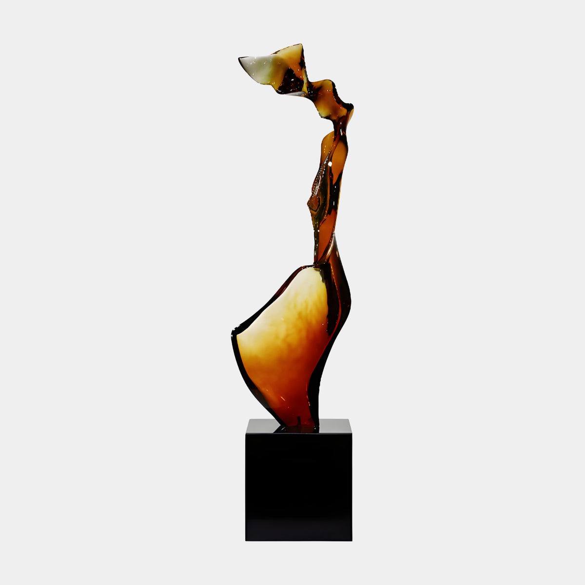 Amber & Cream Arched Upright Resin Sculpture - 140cm, a tall curved form paling from amber to cream, on a black marble block, shown against a plain light background.
