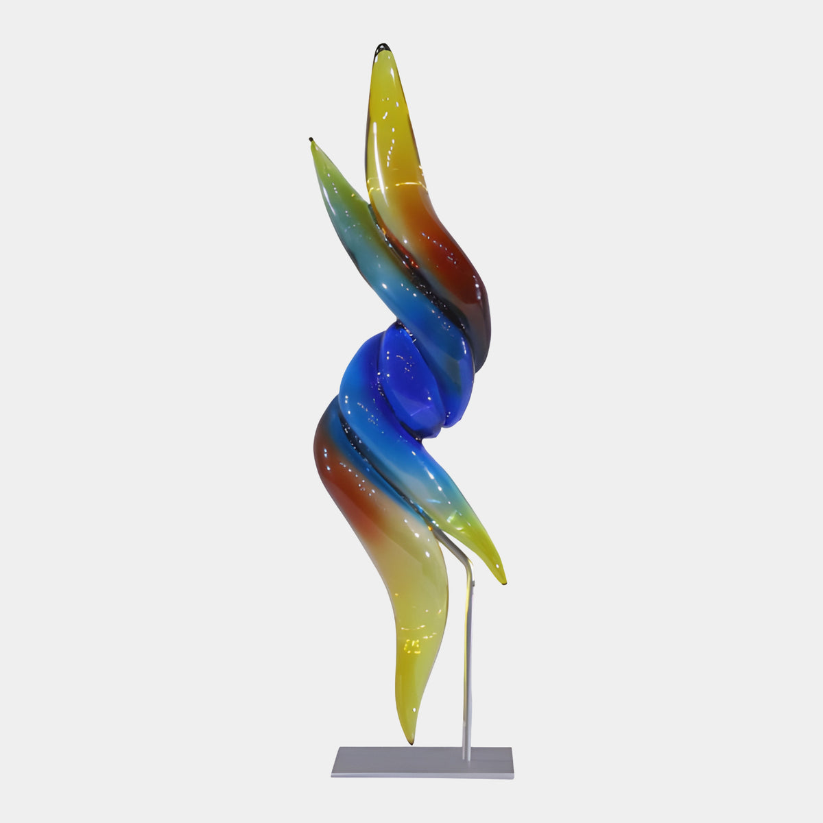 Yellow, Red & Blue Twisting Flame Resin Sculpture (45cm) by Giant Sculptures, polished twisted form on a metal stand, set against a plain white background.