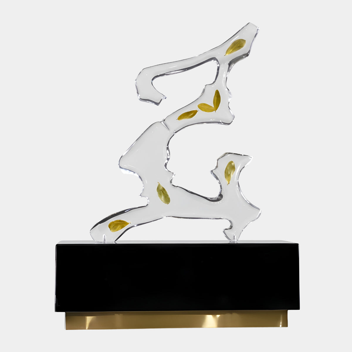 Clear & Gold Leaf Plate Resin Sculpture - 69cm, angular open-cut resin form with gilded leaf accents on a black marble block with gold base, white background.