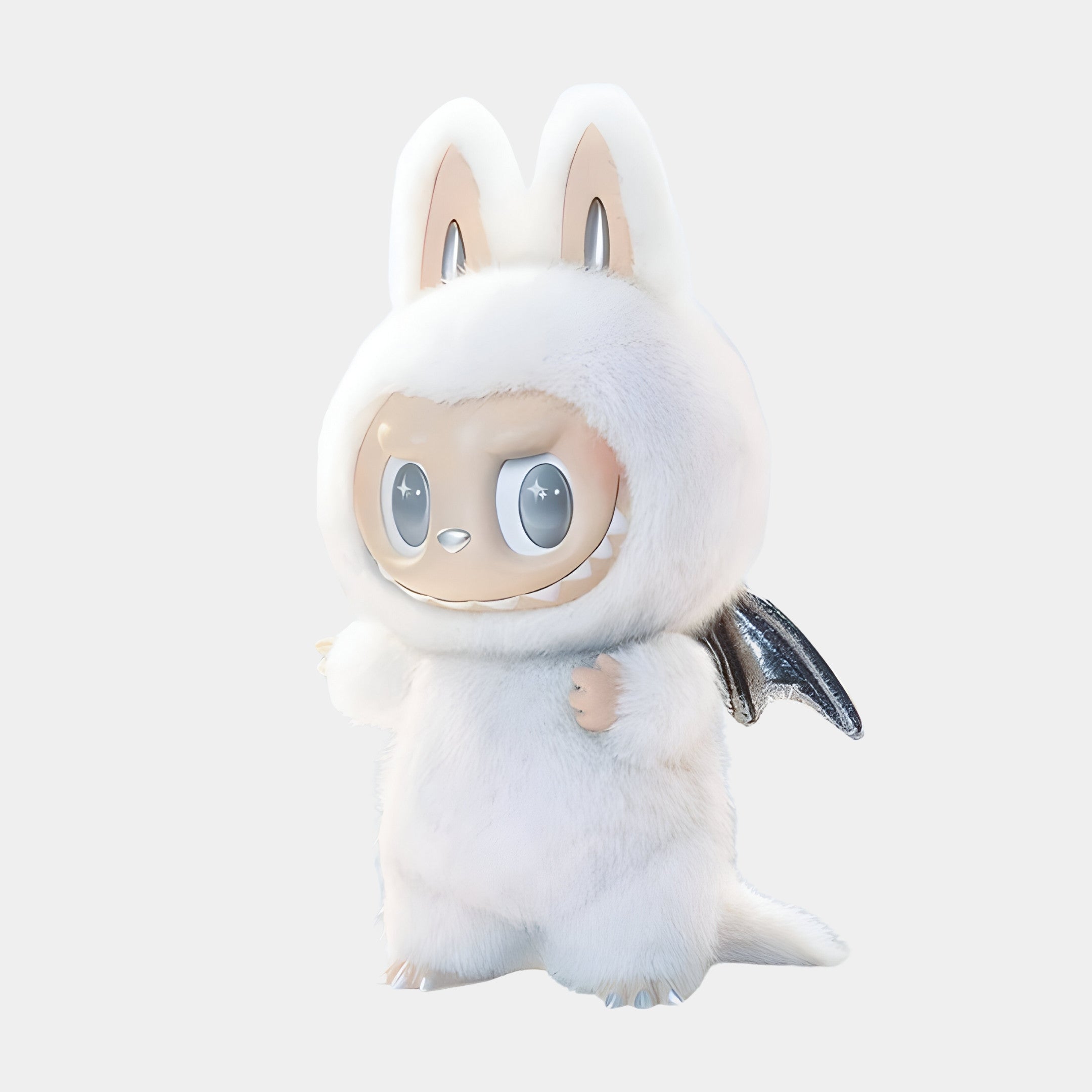 The Zimomo Angel White Labubu Sculpture (100cm) by Giant Sculptures features a cute, chubby character in a fluffy white bunny suit with upright ears, big shiny eyes, a toothy smile, and tiny bat wings, set against a plain light background.