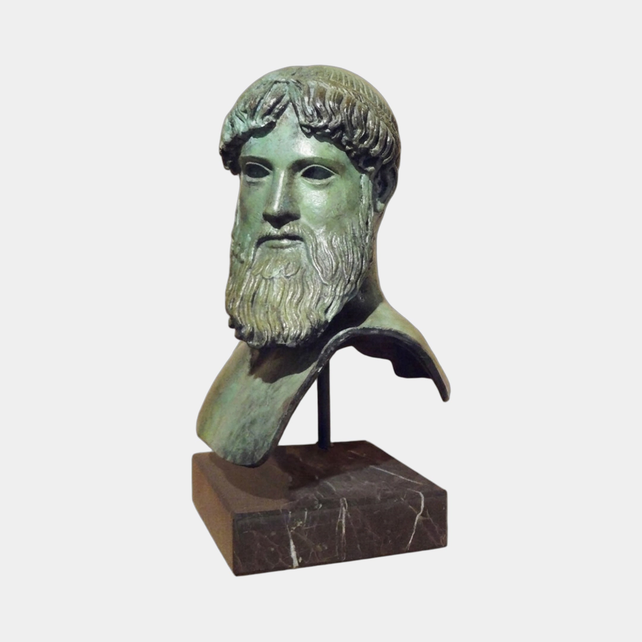 Classical Bearded Male Bust Bronze Bust by Giant Sculptures, 65cm, shown frontally with green verdigris patina on a dark veined marble plinth against a light background.