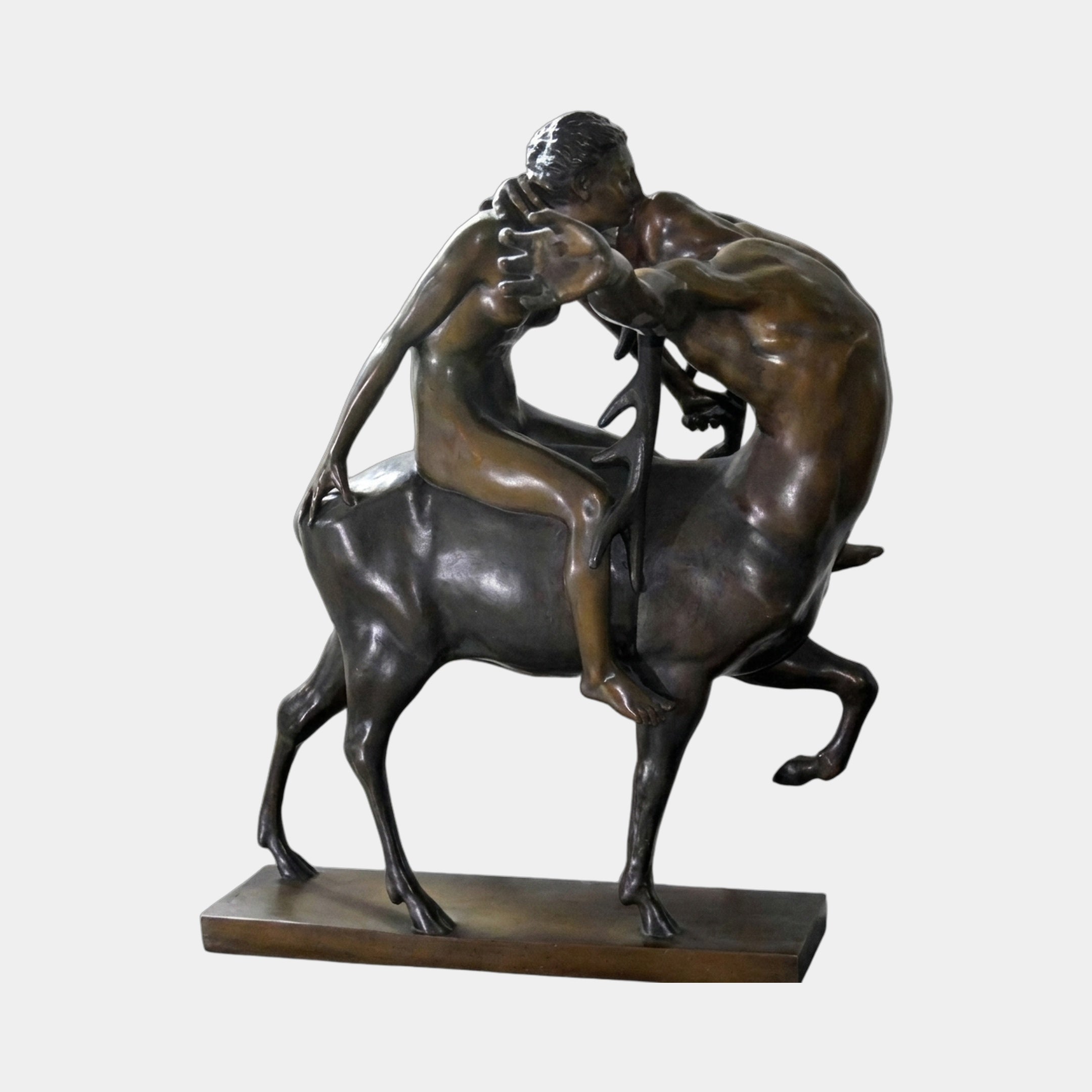 Classical Centaur and Nude Female Figure Bronze Sculpture by Giant Sculptures, rearing centaur grappling with the female figure in two-tone dark patina.