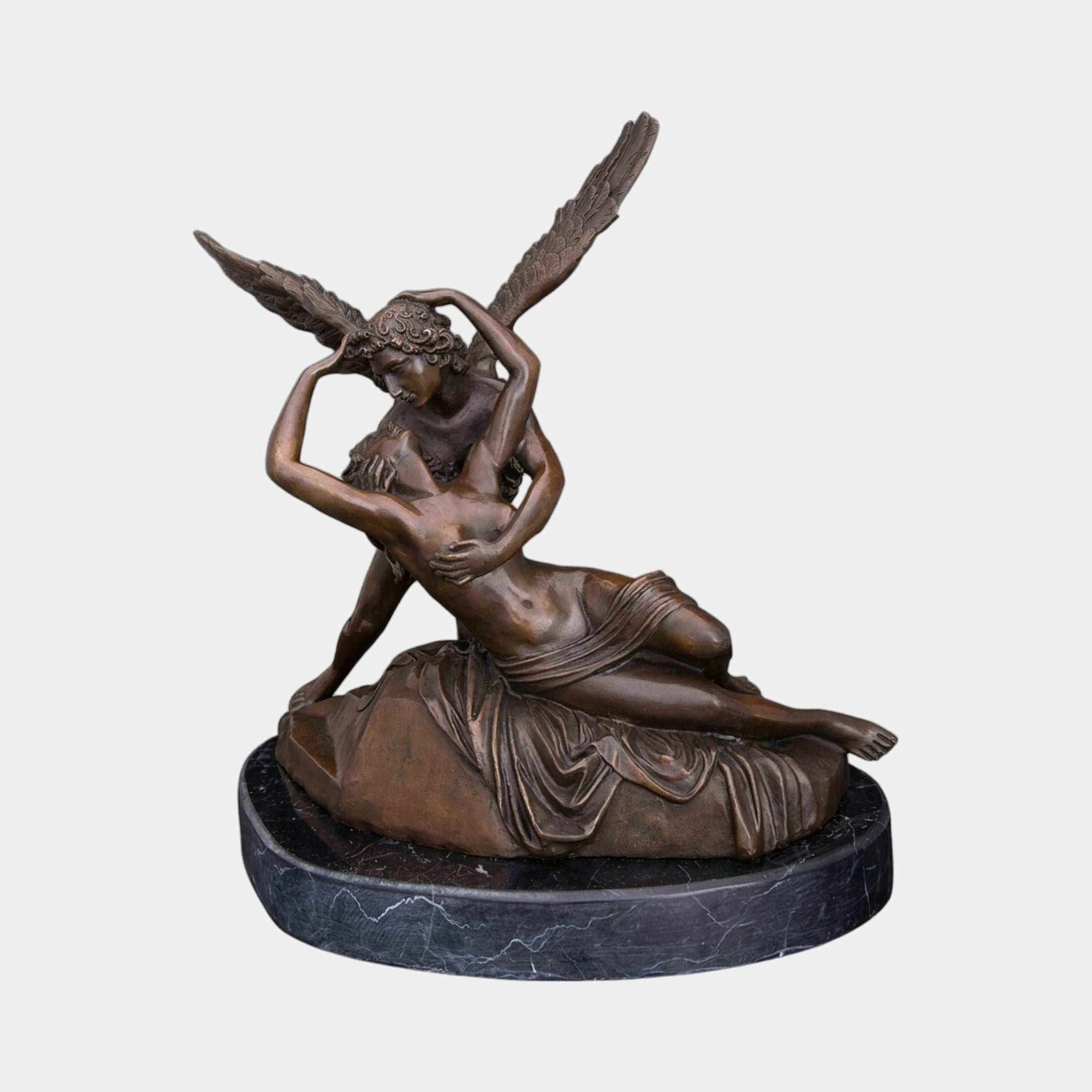 Large Classical Cupid and Psyche Bronze Sculpture by Giant Sculptures, winged Cupid embracing reclining Psyche in warm brown patina on a black granite base.