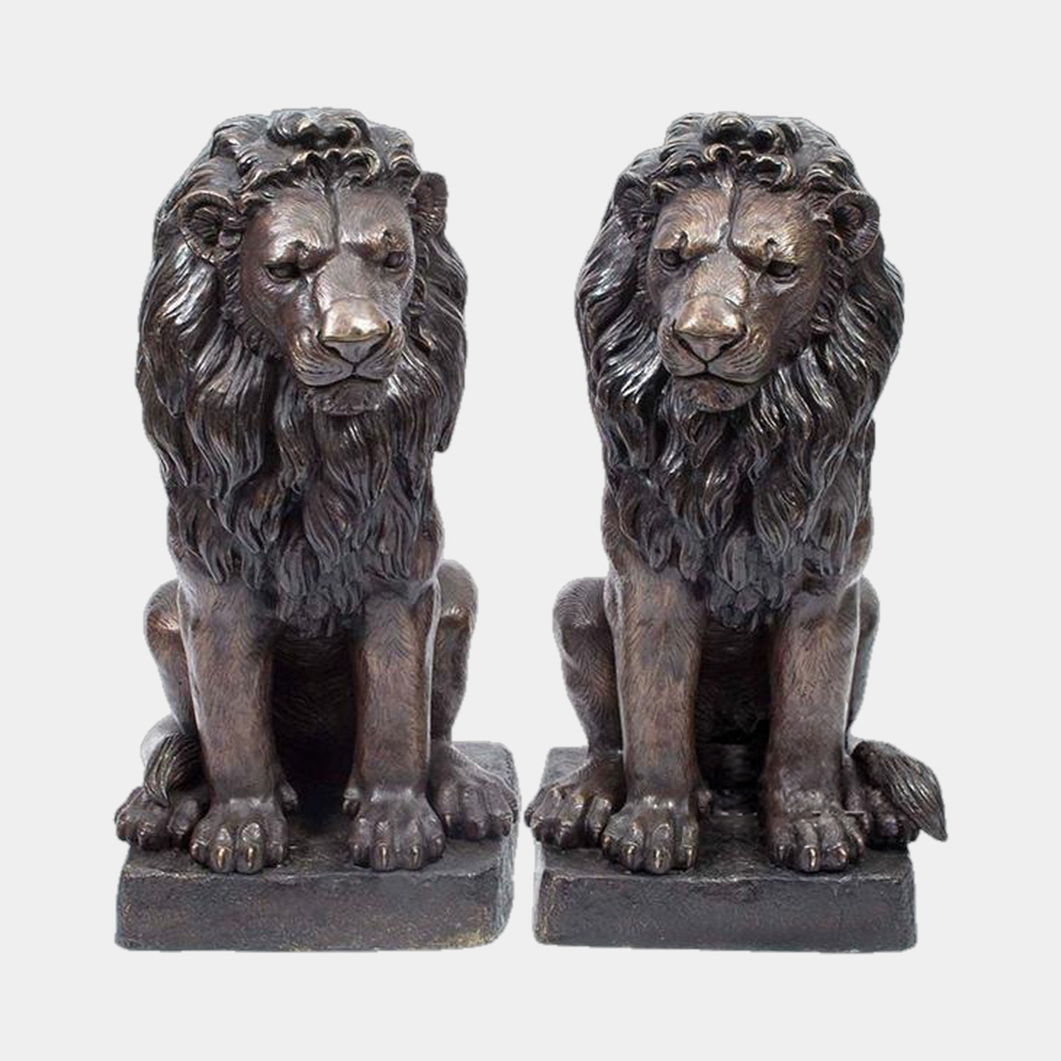 Large Classical Seated Lion Pair Bronze Sculpture by Giant Sculptures, two upright lions with flowing manes and dark patina on plinths, plain background.