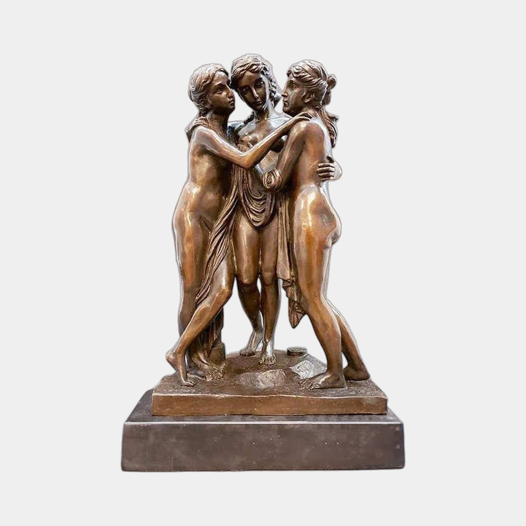 Giant Sculptures' Large Classical Three Graces Bronze Sculpture 220cm, three embracing female figures with warm patina on a dark marble plinth, plain background.