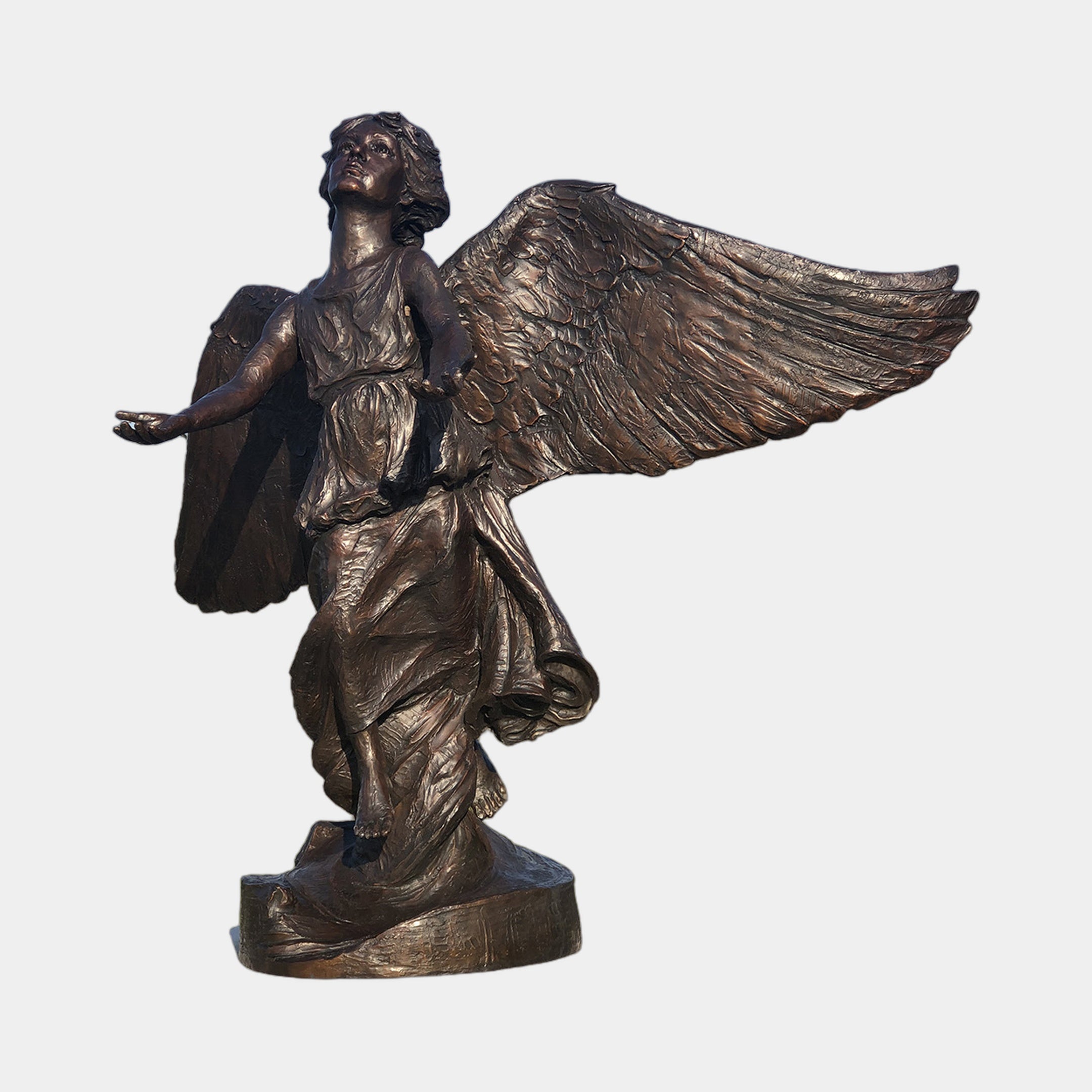 Large Classical Winged Angel Bronze Sculpture by Giant Sculptures, 180cm figure with spread wings, flowing robes, and upward gaze in dark patina on a plain background.