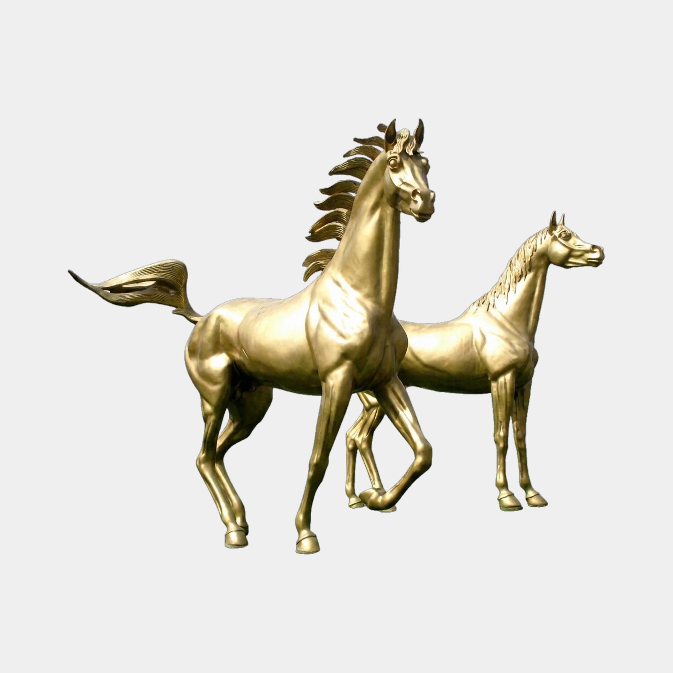 Large Contemporary Cantering Horse Pair Bronze Sculpture by Giant Sculptures in polished gold finish, two life-size horses mid-stride on a plain background.