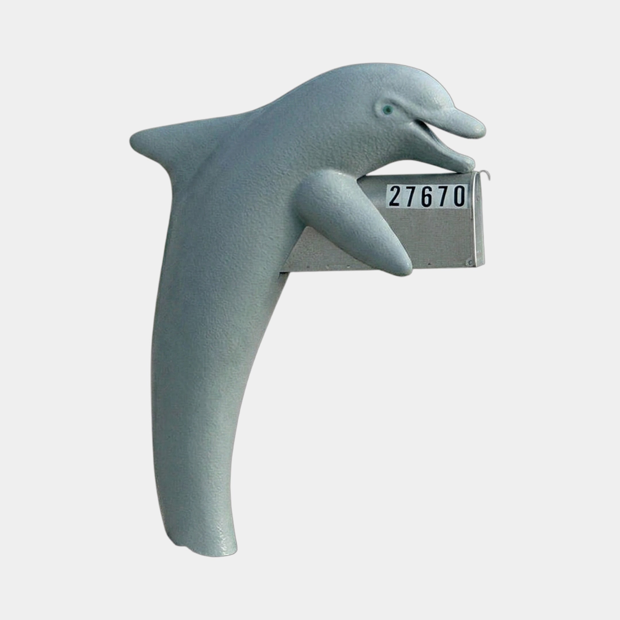 Large Contemporary Leaping Dolphin Bronze Sculpture by Giant Sculptures in light grey-blue finish, mouth gripping a mailbox marked 27670, on a plain background.