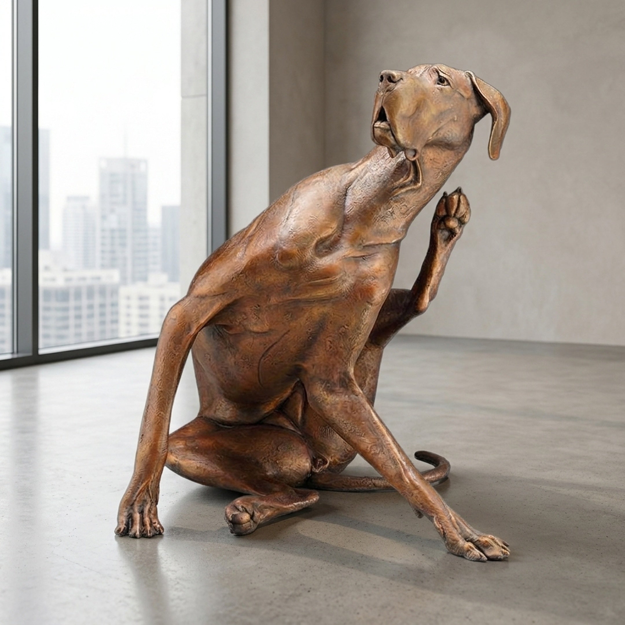 Large Contemporary Scratching Dog Bronze Sculpture by Giant Sculptures, 100cm, seated with head tilted up and foreleg raised, in a concrete room by a city-view window.