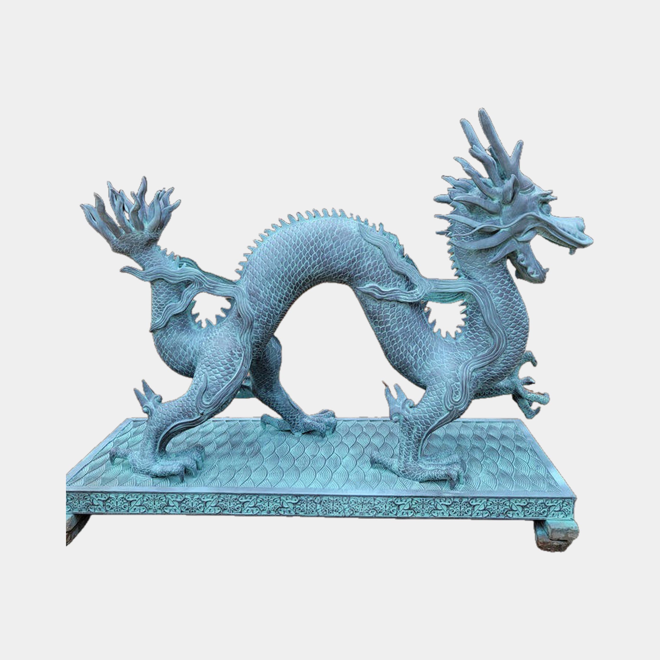 Large Traditional Chinese Dragon Bronze Sculpture by Giant Sculptures in turquoise verdigris finish, coiled S-curve pose on a wave-relief rectangular plinth.