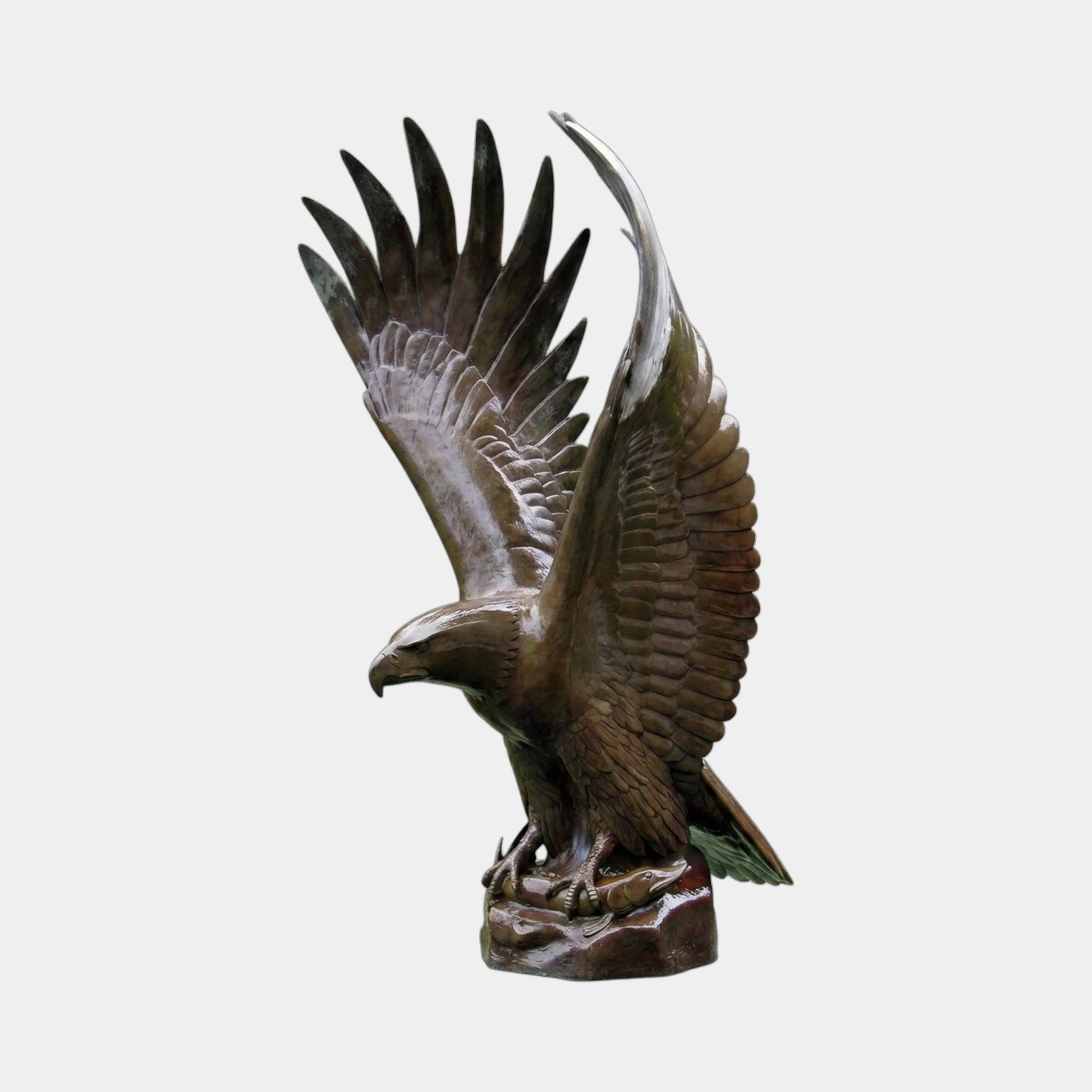 Large Traditional Diving Eagle Bronze Fountain by Giant Sculptures, 220cm, shown in side view with wings raised, talons gripping prey on a rocky base.