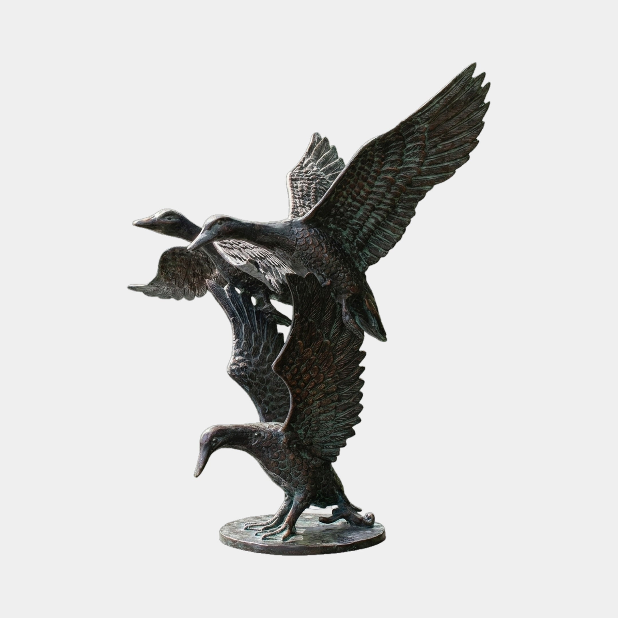 Large Traditional Flying Mallard Ducks Bronze Sculpture by Giant Sculptures, three mallards stacked in vertical ascending take-off with spread wings, dark patina.