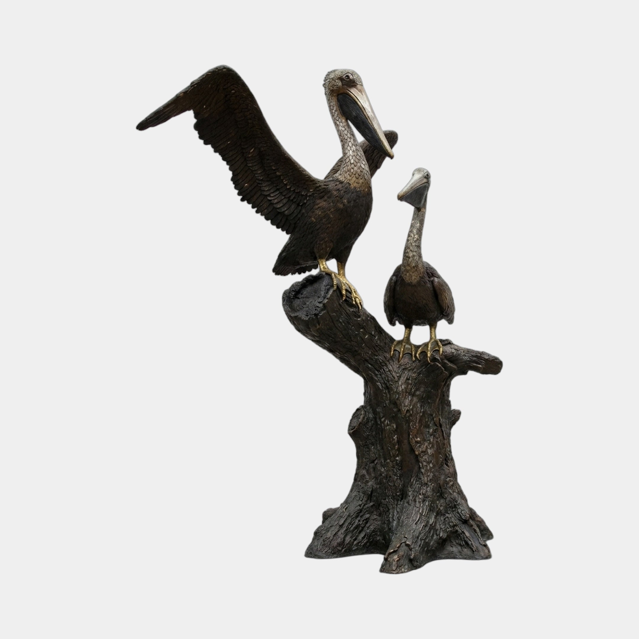 Large Traditional Twin Pelican Bronze Fountain by Giant Sculptures, two pelicans on a tree stump with one wing fully spread, dark patina, on a plain background.