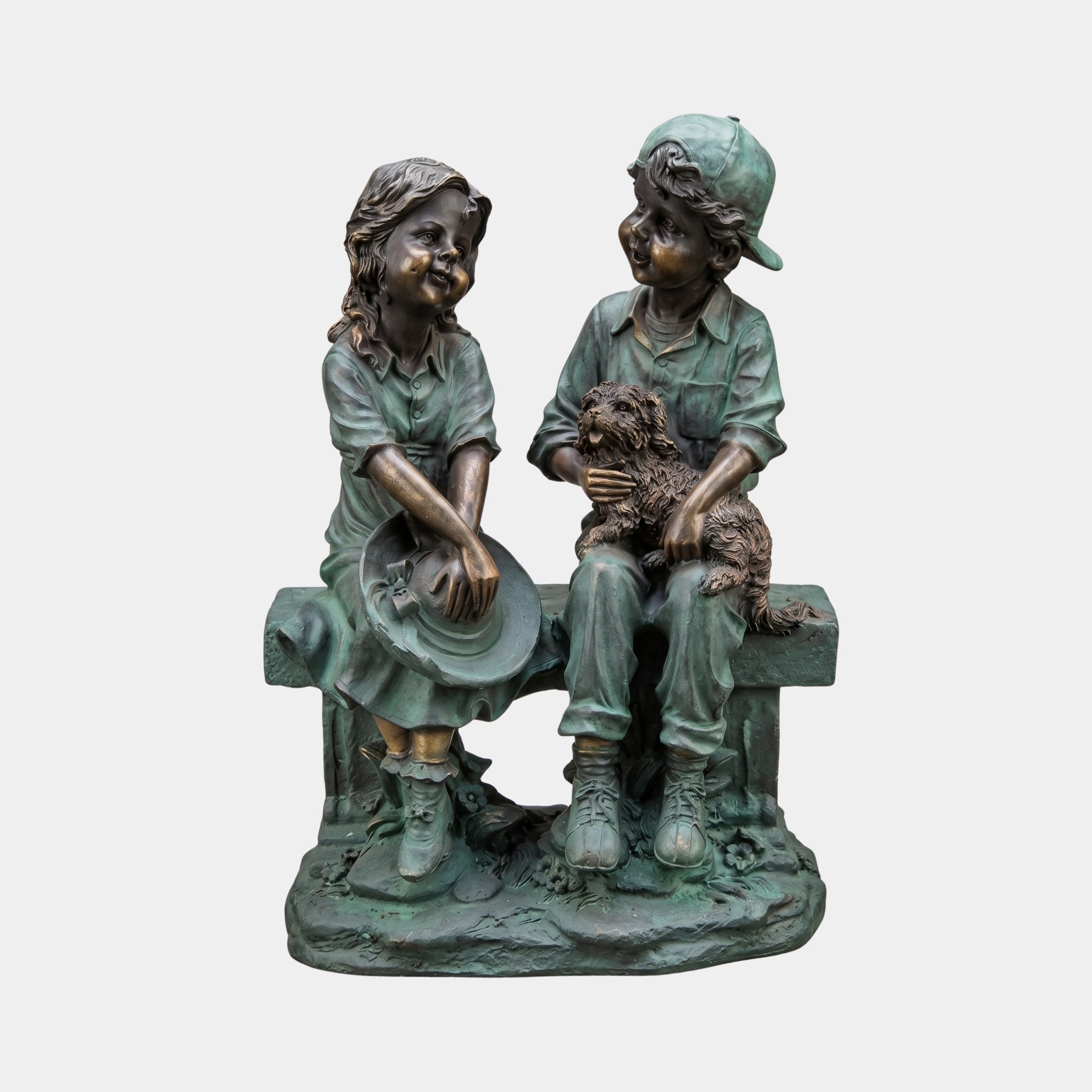 Giant Sculptures' Large Traditional Two Children and Dog Bronze Sculpture in verdigris green with bronze highlights, showing a girl with hat and boy holding a dog on a bench.