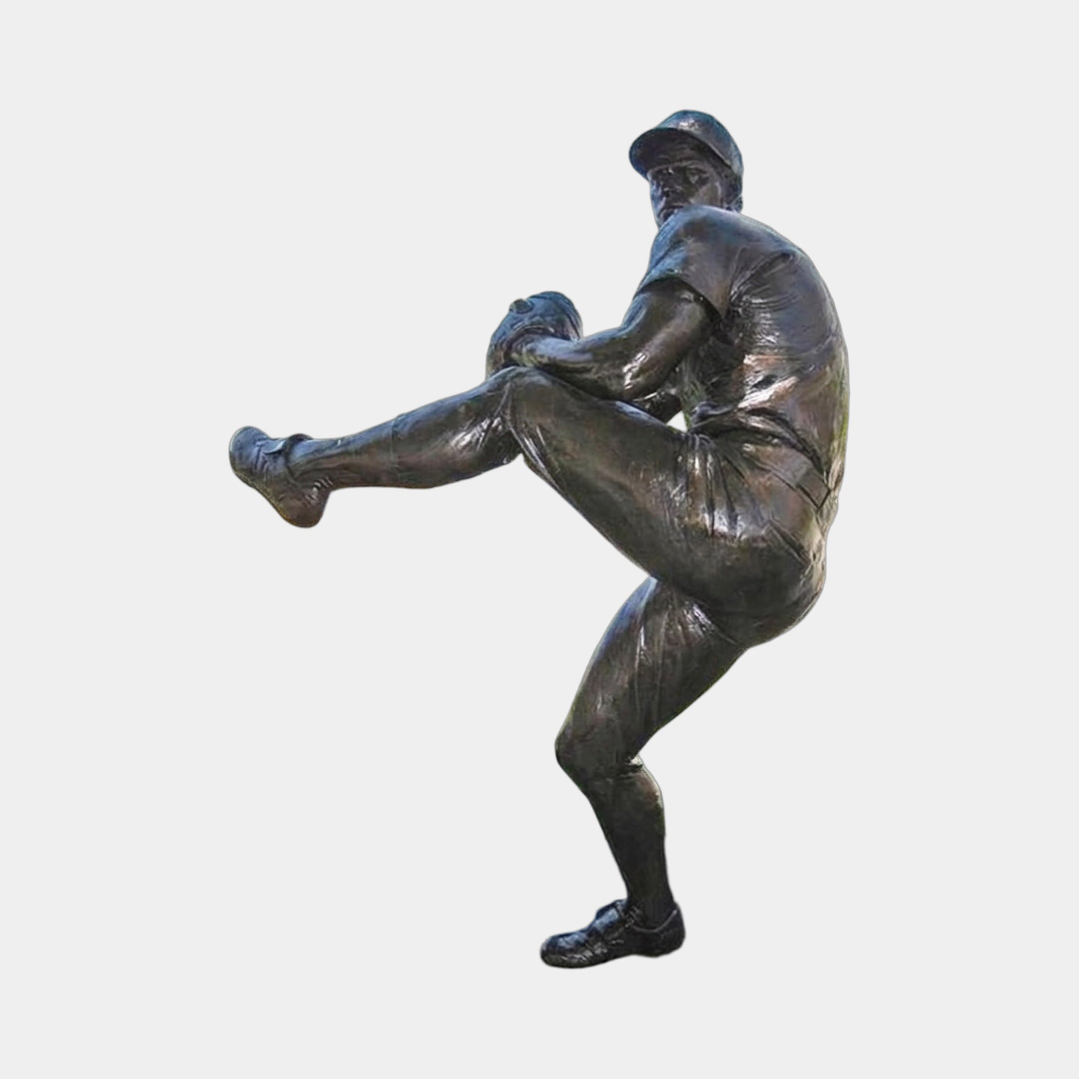 Giant Sculptures Life-Size Baseball Pitcher Bronze Statue 310cm shown side-on mid wind-up with knee raised and hands clasping the ball, dark patina, plain background.