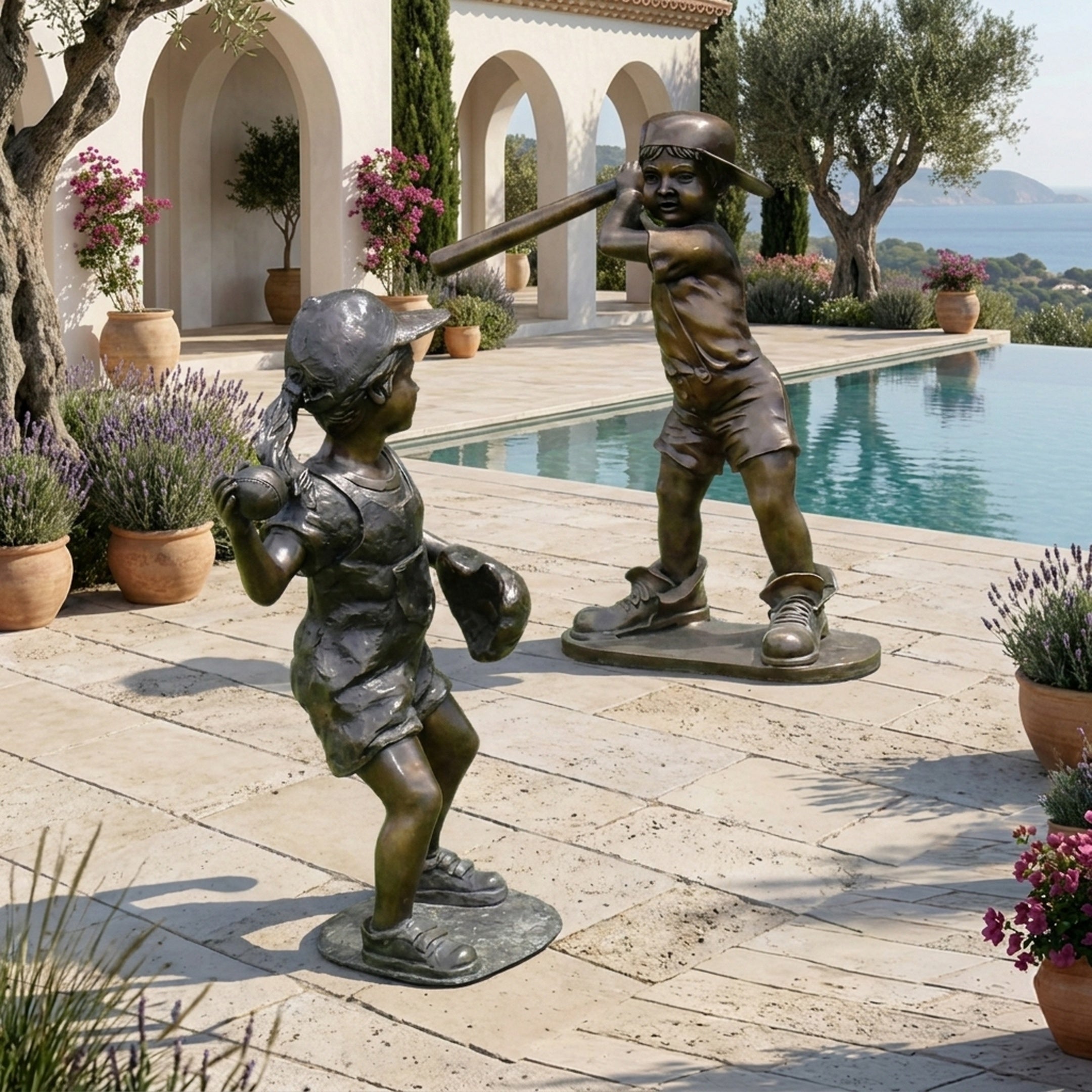 Life-Size Children Baseball Players Bronze Sculpture Set by Giant Sculptures, 120cm, shown poolside with the batter mid-swing and the pitcher winding up.
